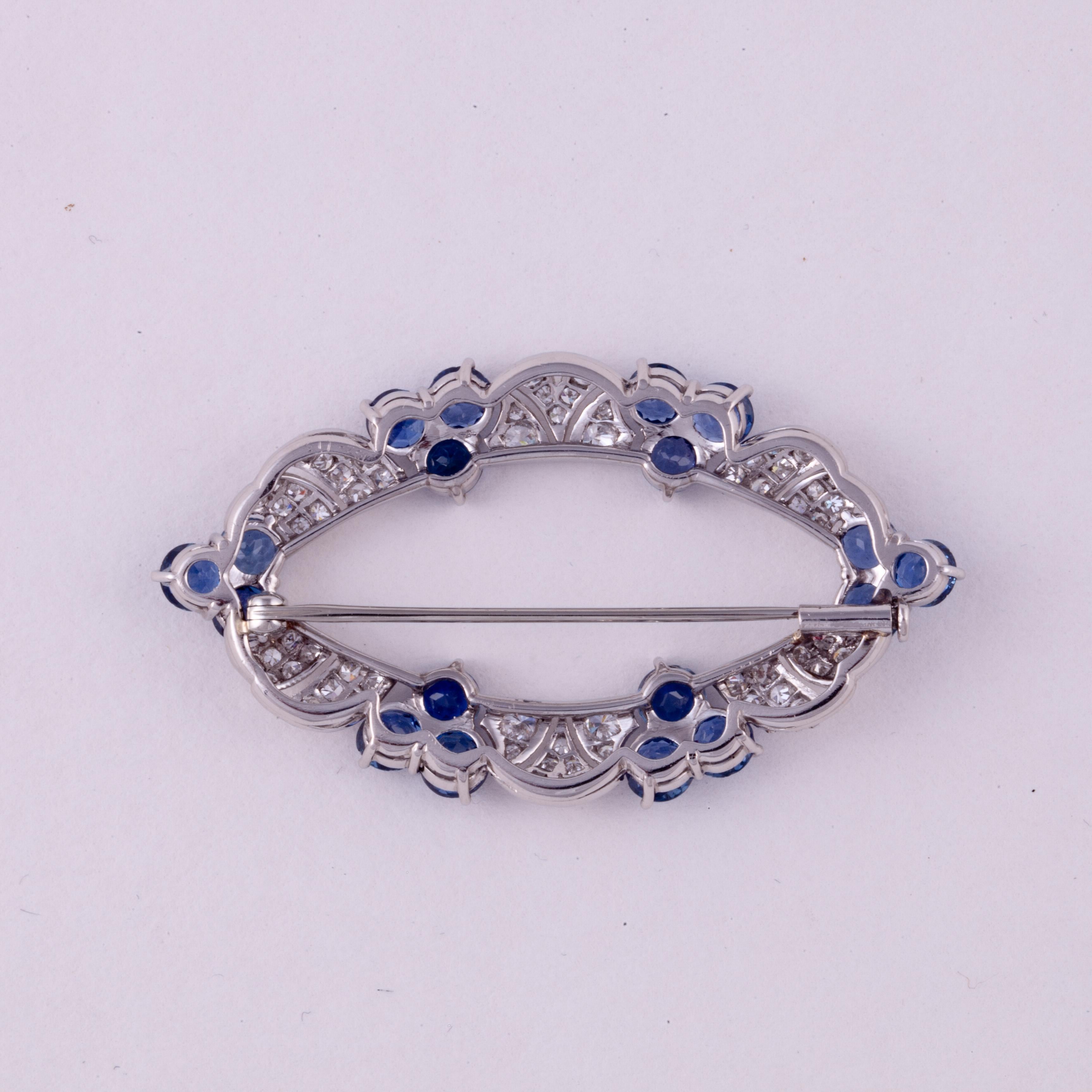 Estate Platinum Diamond and Sapphire Brooch In Good Condition For Sale In Houston, TX