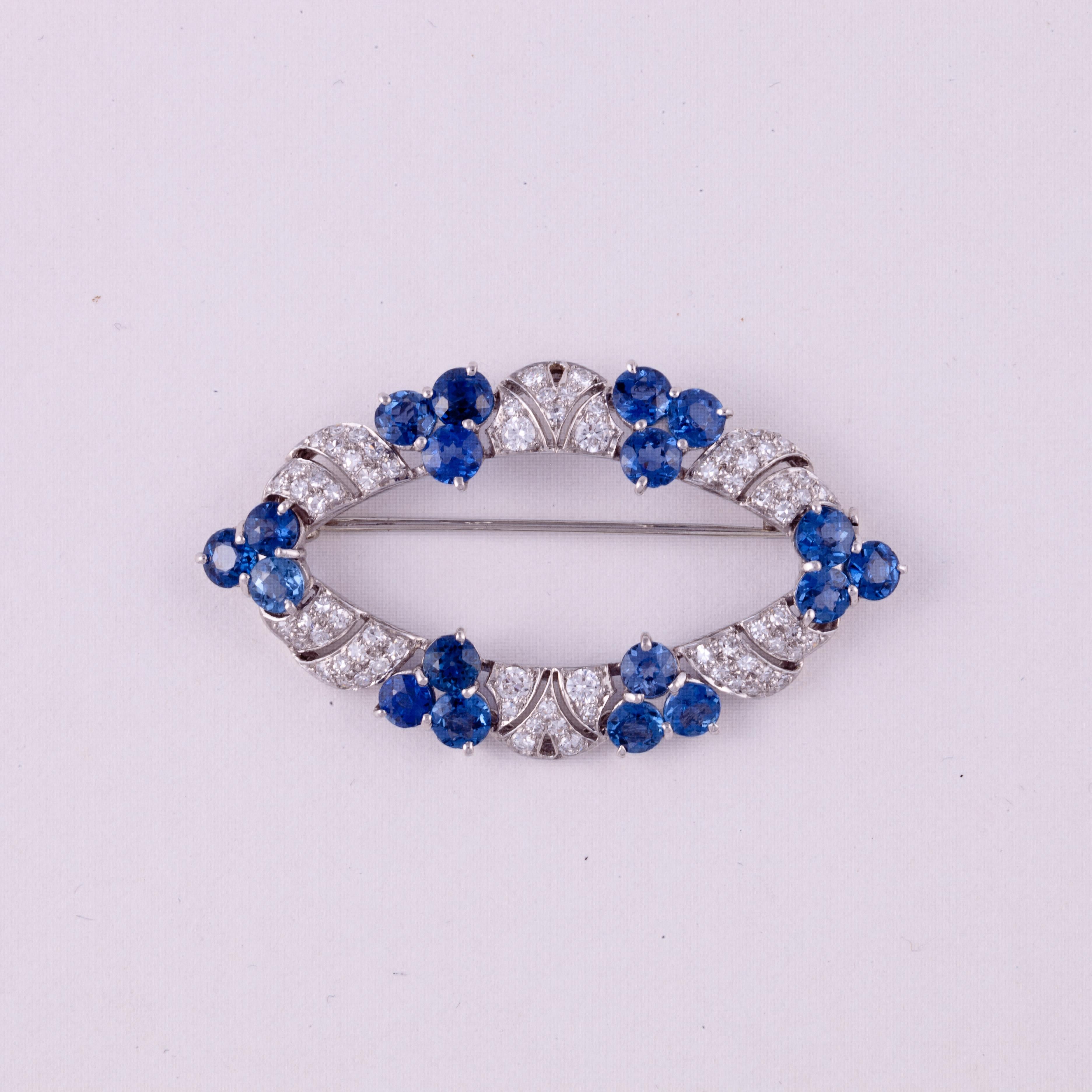 Round Cut Estate Platinum Diamond and Sapphire Brooch For Sale