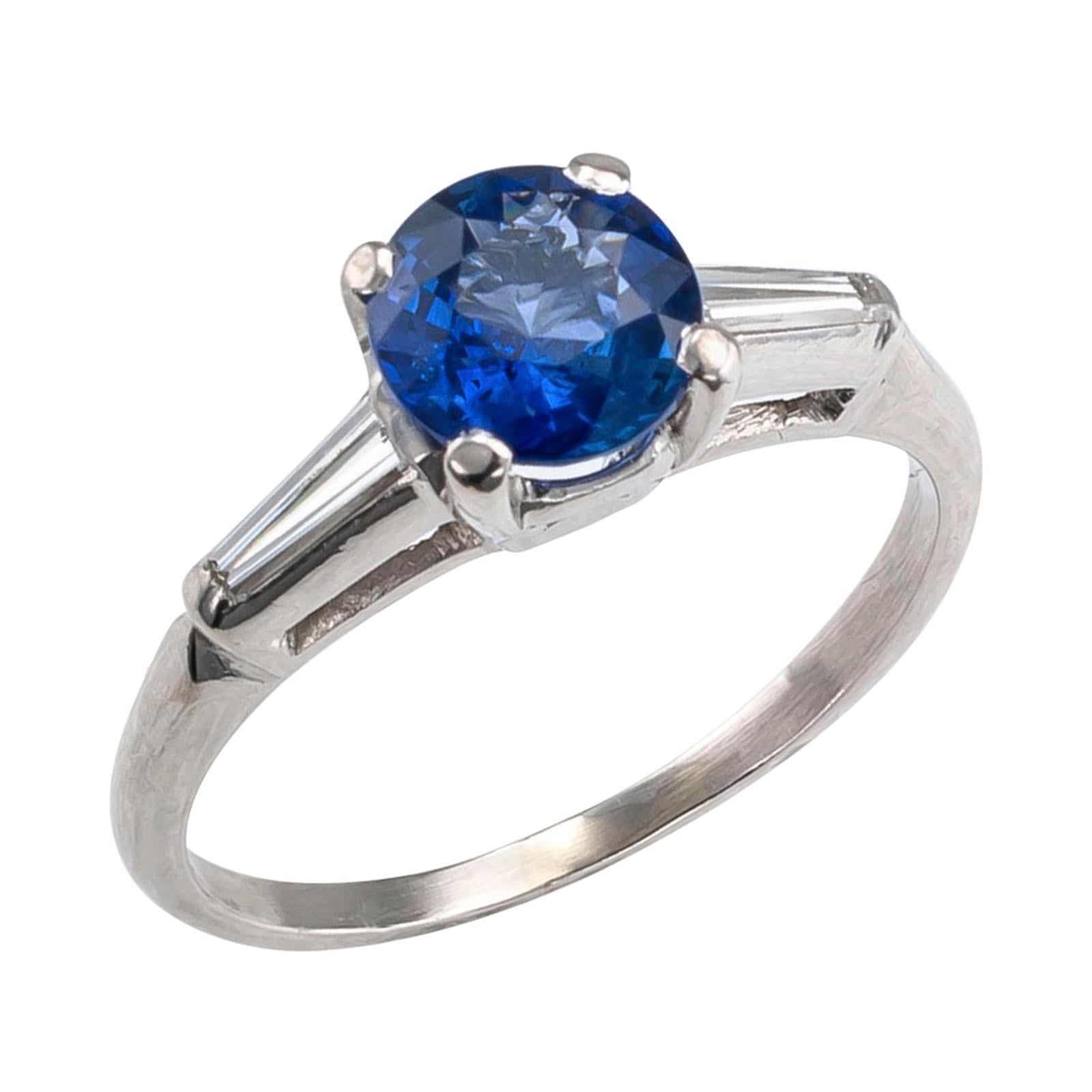 Modern Sapphire Diamond Platinum Engagement Ring For Sale