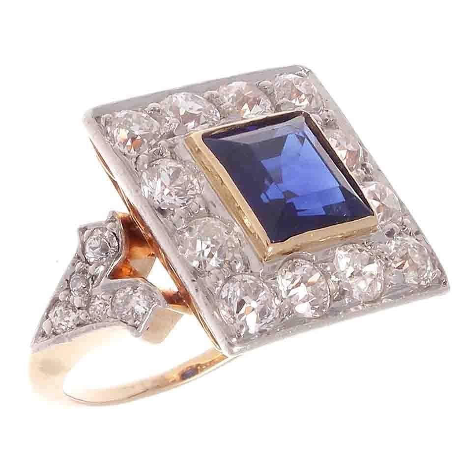 A portrait of colors is exhibited in this spectacular art deco ring. Featuring an approximately 2.00 carat AGL certified Cambodian no heat royal blue sapphire. Framed by 12 old cut diamonds weighing approximately 1.45 carats. Hand crafted in