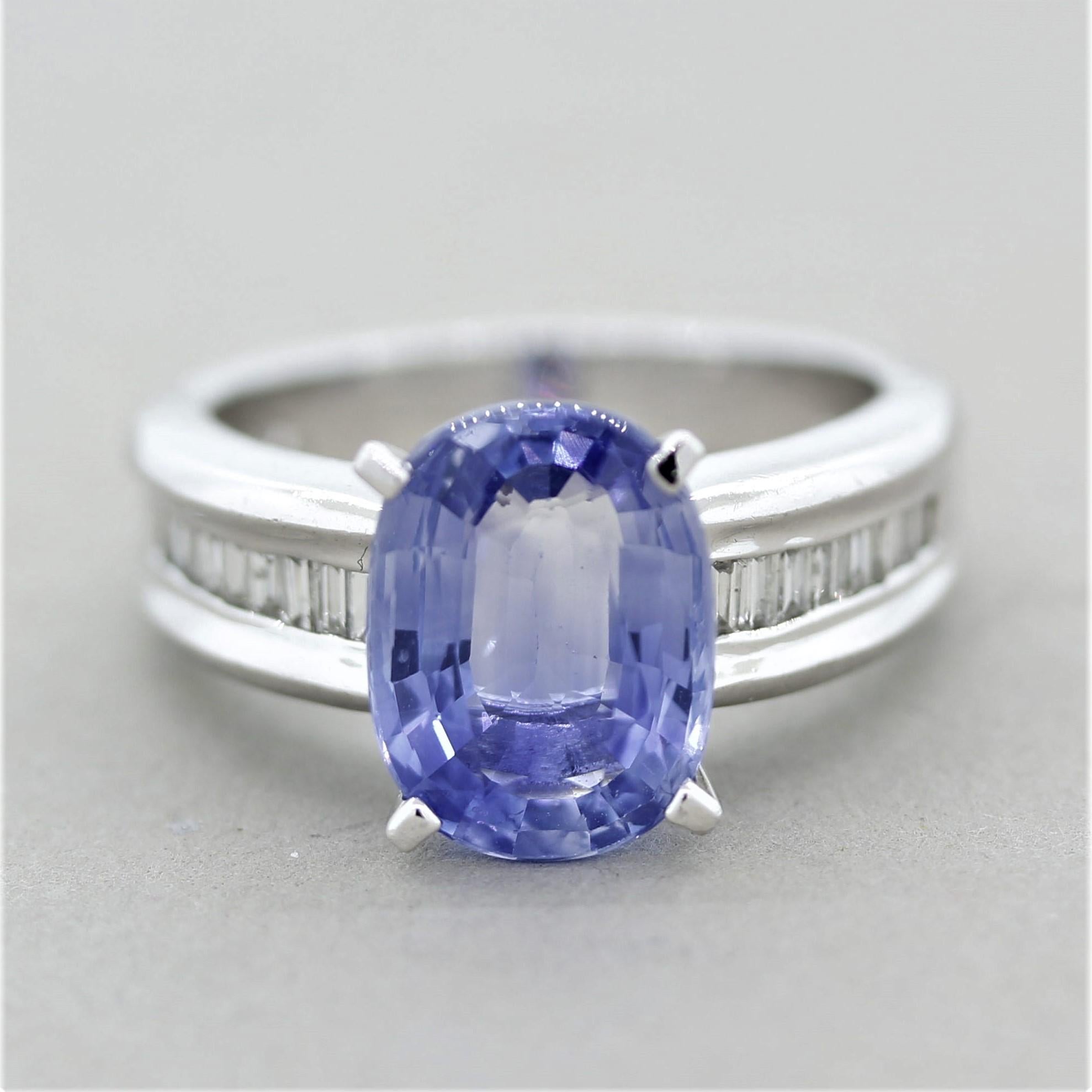 A simple yet elegant platinum ring featuring a 4.71 carat oval shaped blue sapphire with a light pleasing color. It is accented by 0.36 carats of baguette-cut diamonds. Hand-fabricated in platinum and ready to be worn!

Ring Size 6.75