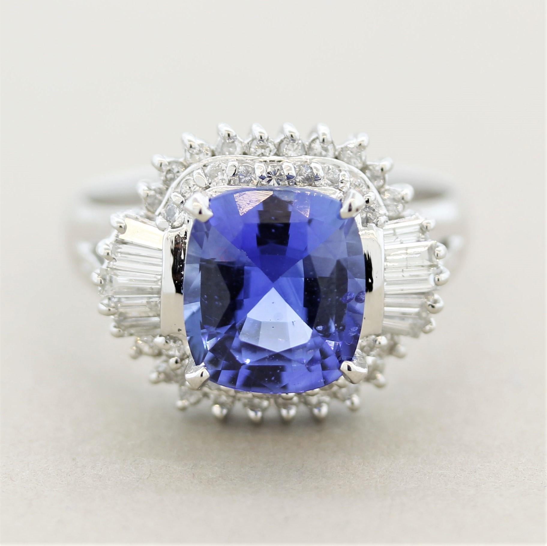 A simple yet fine and elegant gemstone ring. It features a fine sapphire just under 3 carats (2.96ct) which has a rich vivid blue color and is free from any inclusions allowing for the stones natural brightness to shine. It is accented by 0.50
