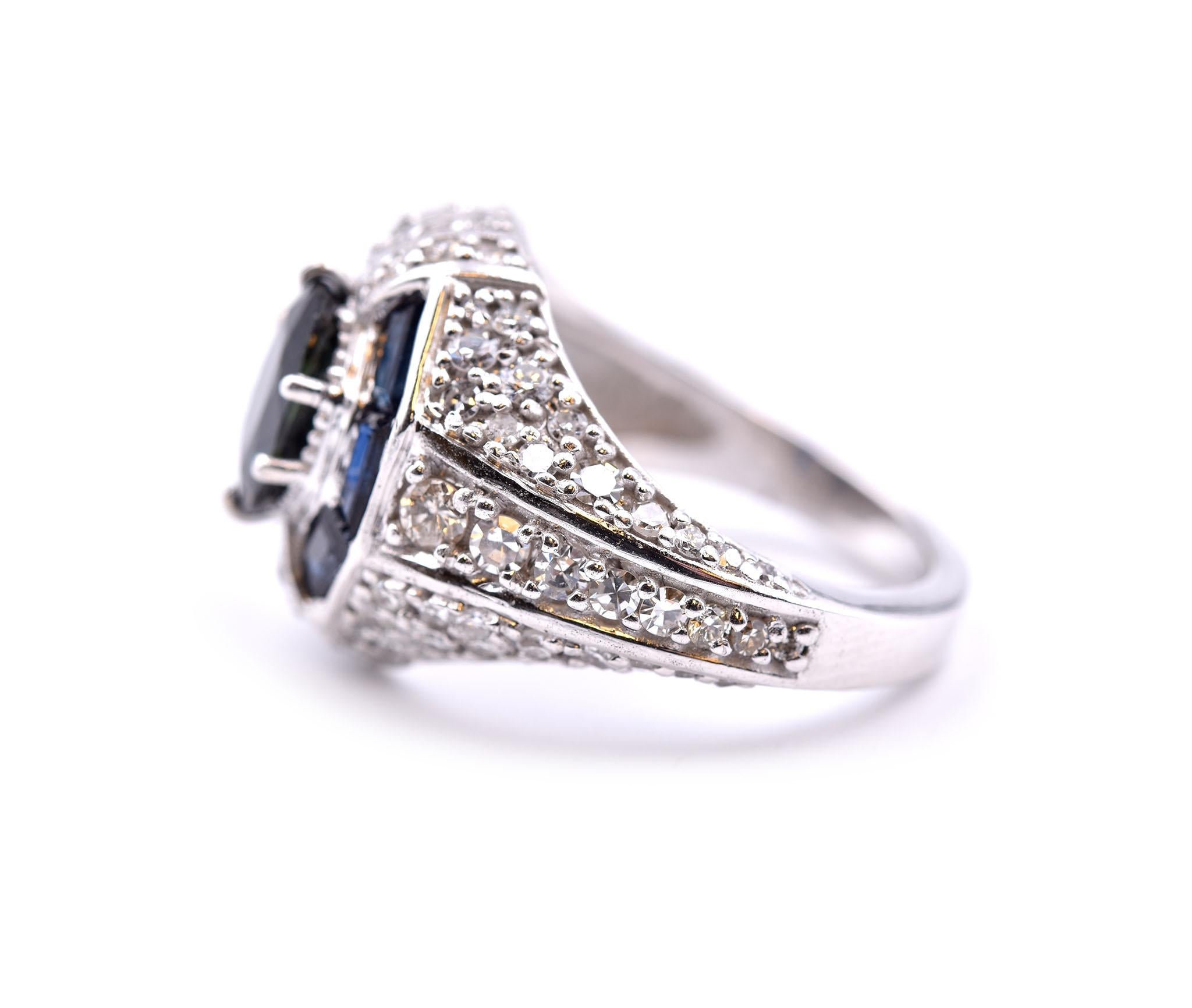 Oval Cut Sapphire and Diamond Platinum Ring