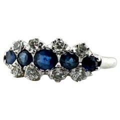 Anello con zaffiro e diamante in oro bianco 14K