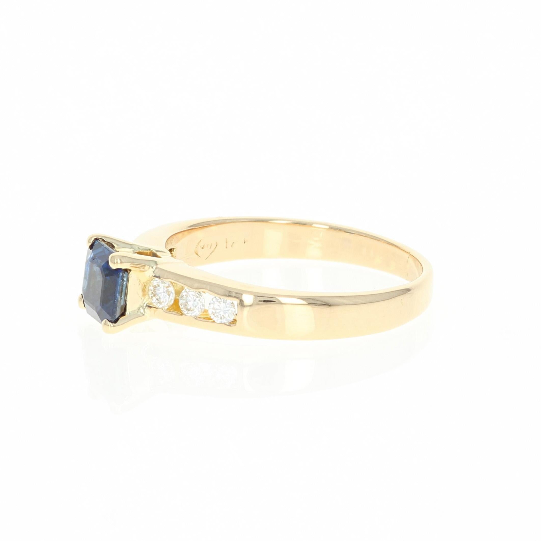 Color her world with this stunning gemstone ring! Luxuriously crafted in 18k yellow gold, this piece showcases a sapphire solitaire, which has a fantastic, top quality blue hue, that is elegantly accompanied by six channel-set icy white diamond