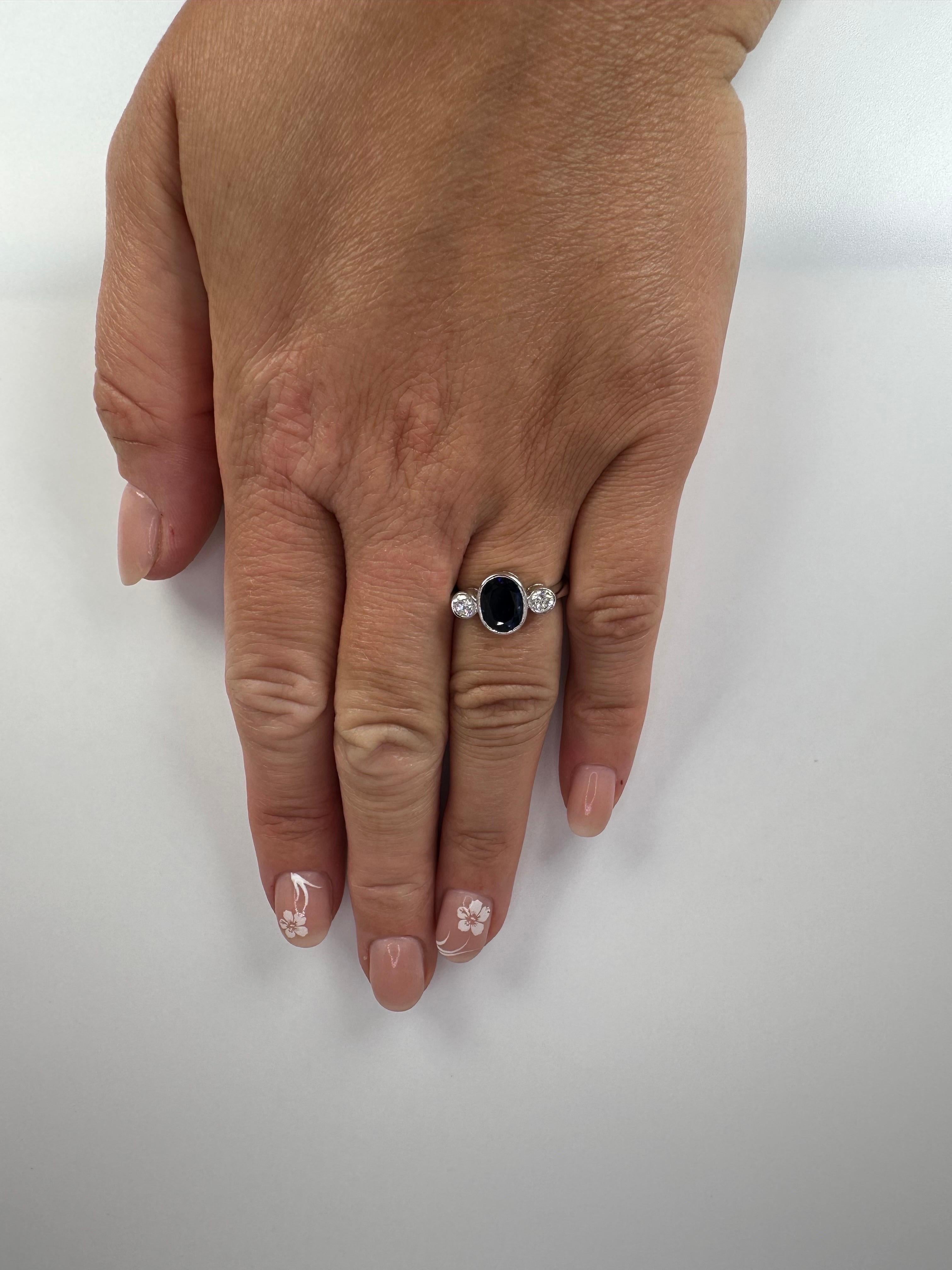 Oval Cut Sapphire Diamond Ring 18 Karat White Gold 2.20 Carat Rare Three Stone Ring For Sale