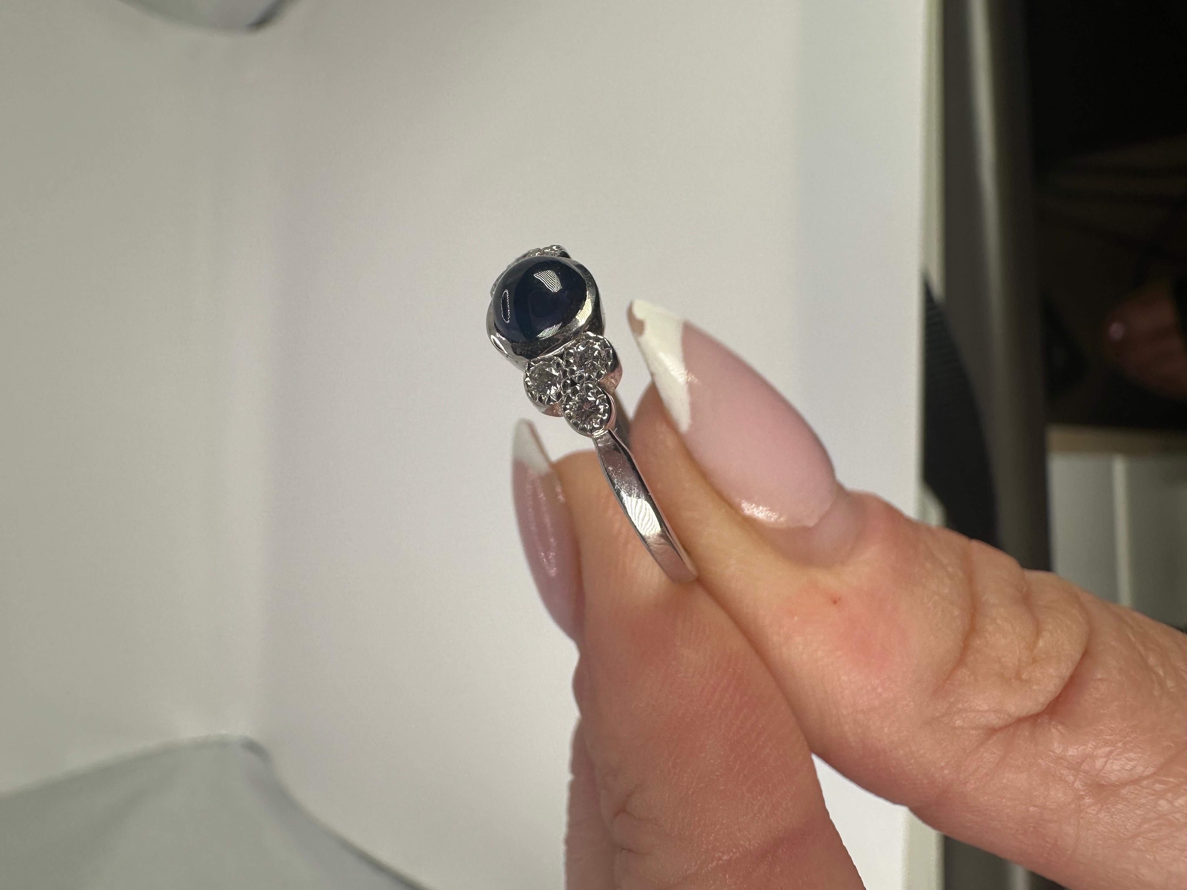 Sapphire cabochon diamond ring in 18KT white gold, sweet ring with a modern setting. This ring is re-sizable.

Certificate of authenticity comes with purchase!

ABOUT US
We are a family-owned business. Our studio in located in the heart of Boca