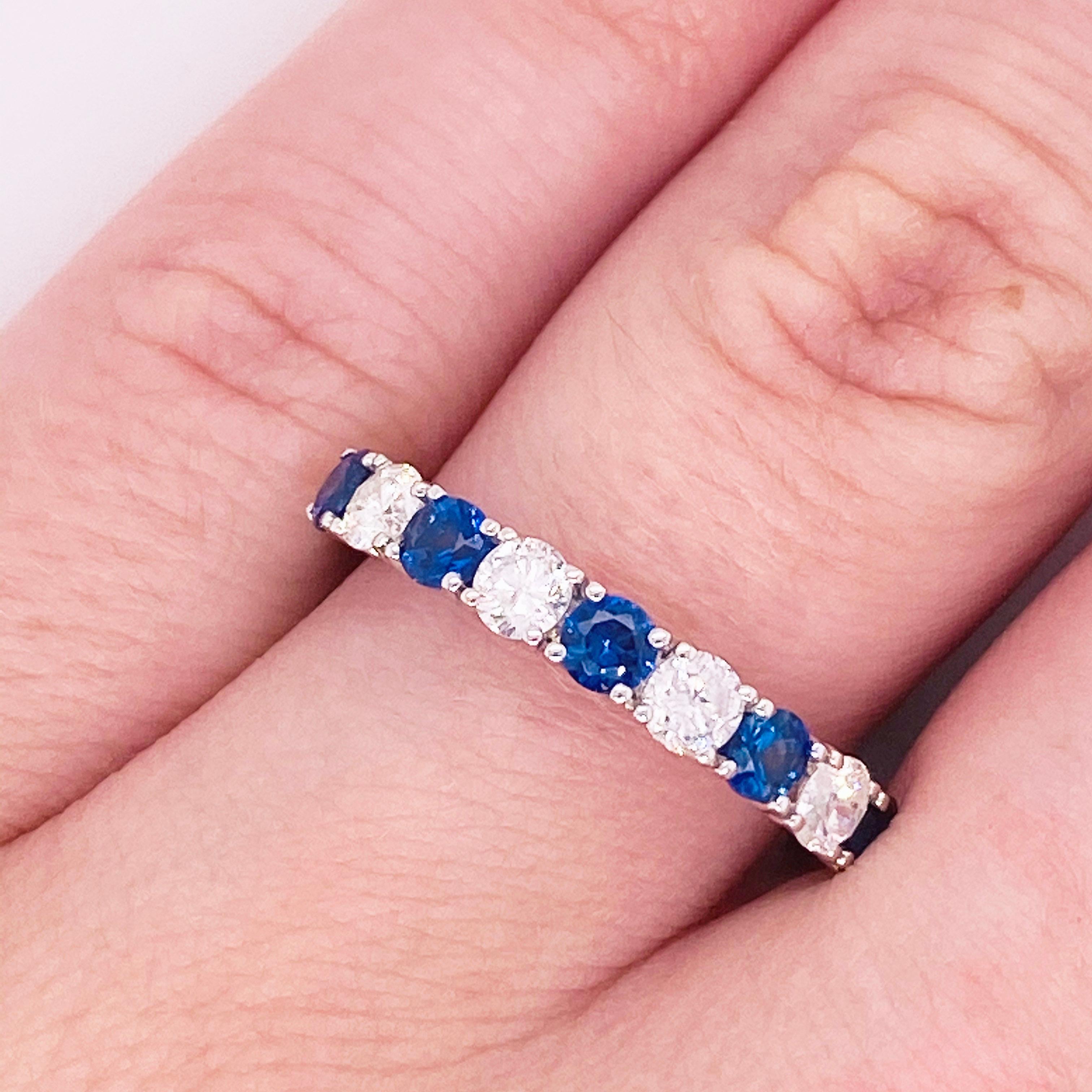 These stunning rich blue sapphires and white diamonds set in polished 18k white gold provide a look that is very classic and modern at the same time! This ring is very fashionable and can add a touch of style to any outfit, yet it is also classy