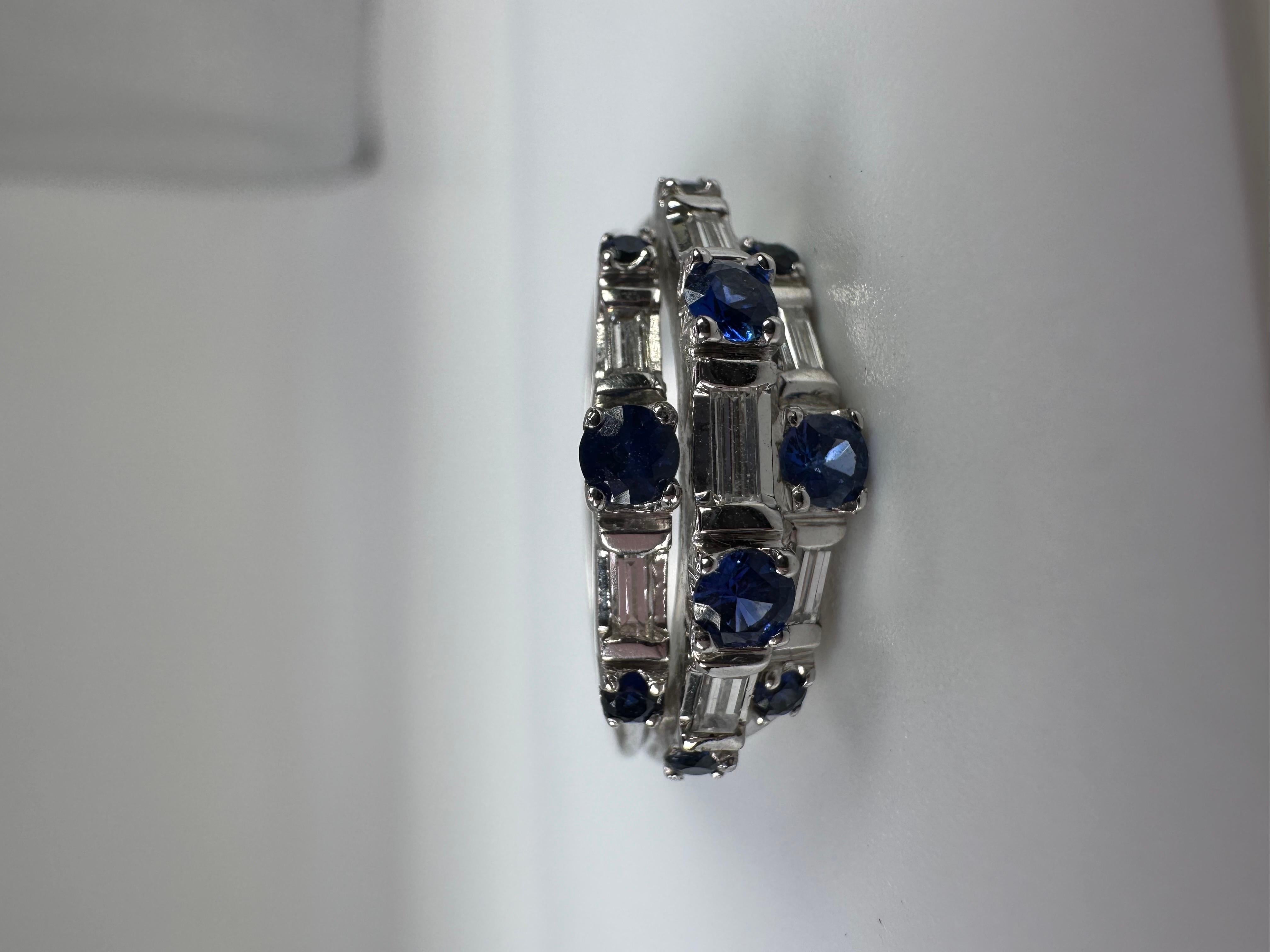 Unique designer ring made with three rows of baguette diamonds and blue sapphires in 14KT white gold.

GOLD: 14KT gold
NATURAL DIAMOND(S)
Clarity/Color: VS/G
Carat:0.46ct
Cut:Baguette
NATURAL SAPPHIRE(S)
Clarity/Color: Slightly