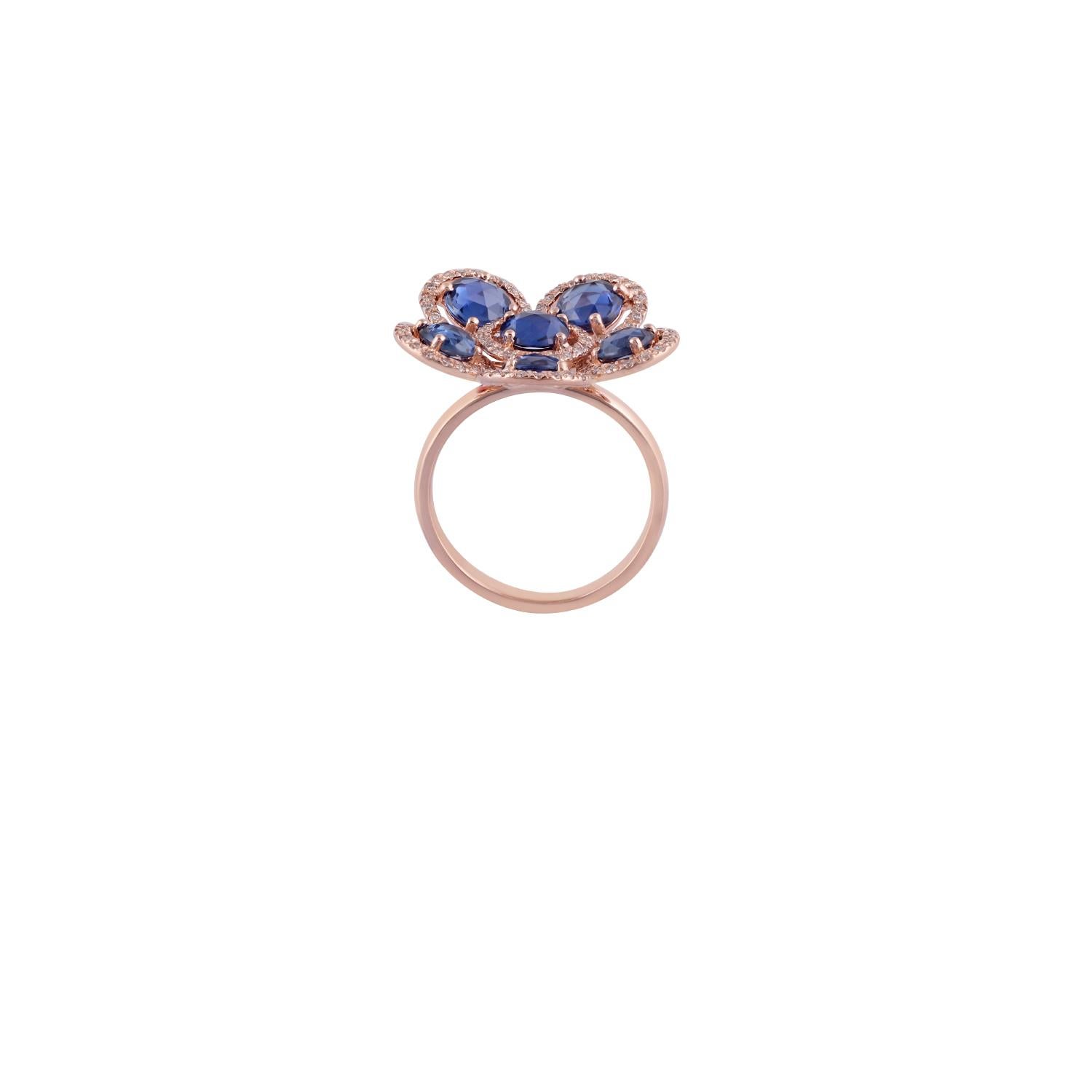 This is an exclusive floral design ring in 18K rose gold, features 6 pcs of round shaped rose cut blue sapphires weight 3.36 carats with 118 pieces of round shaped brilliant cut diamonds weight 0.47 carats, this entire ring is studded in 18K rose