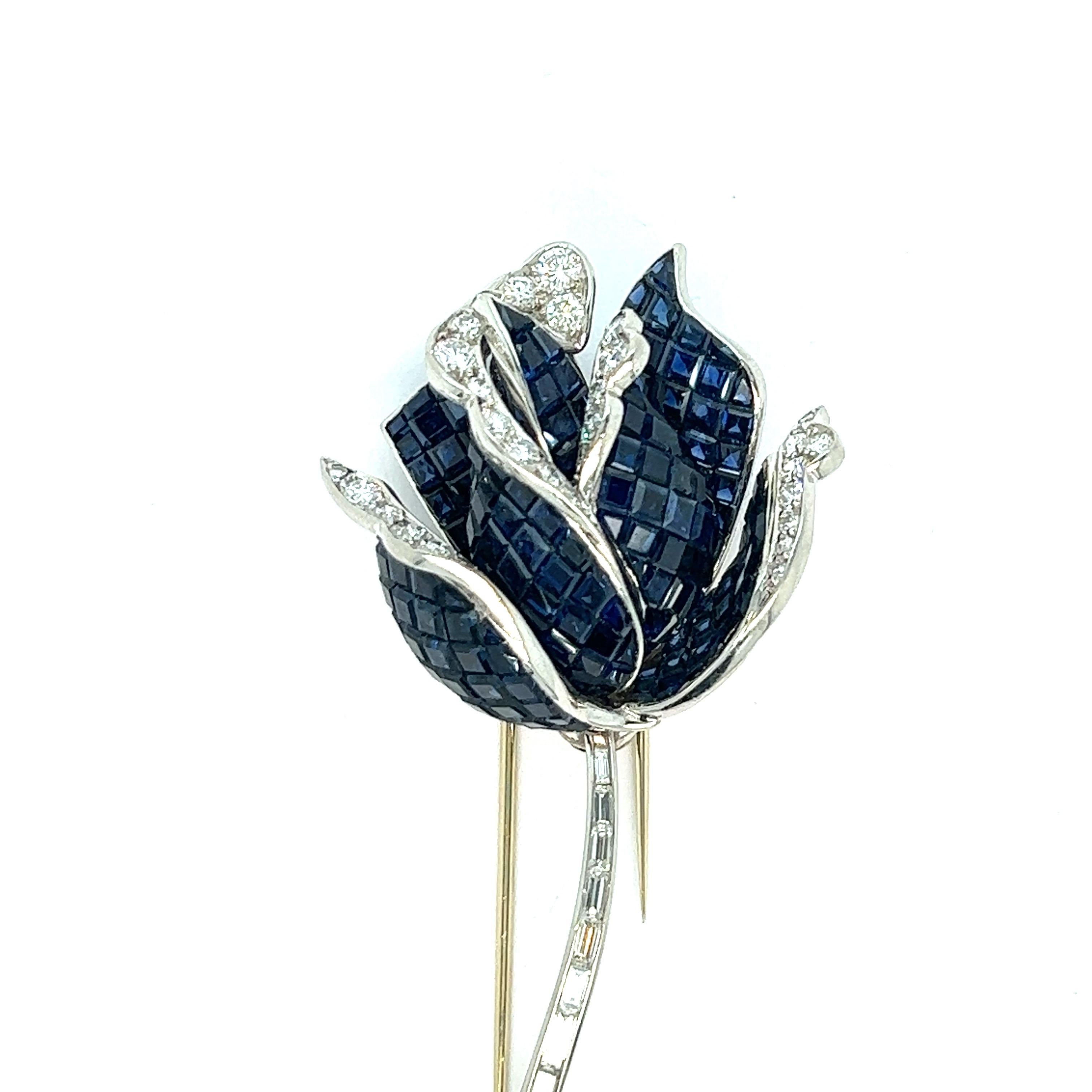 Sapphire diamond rose brooch

1950s very high quality French brooch, featuring invisible sapphire of approximately 35 carats and round- and baguette-cut diamonds of approximately 4.5 carats set in platinum; French maker's mark

Size: width 1.38