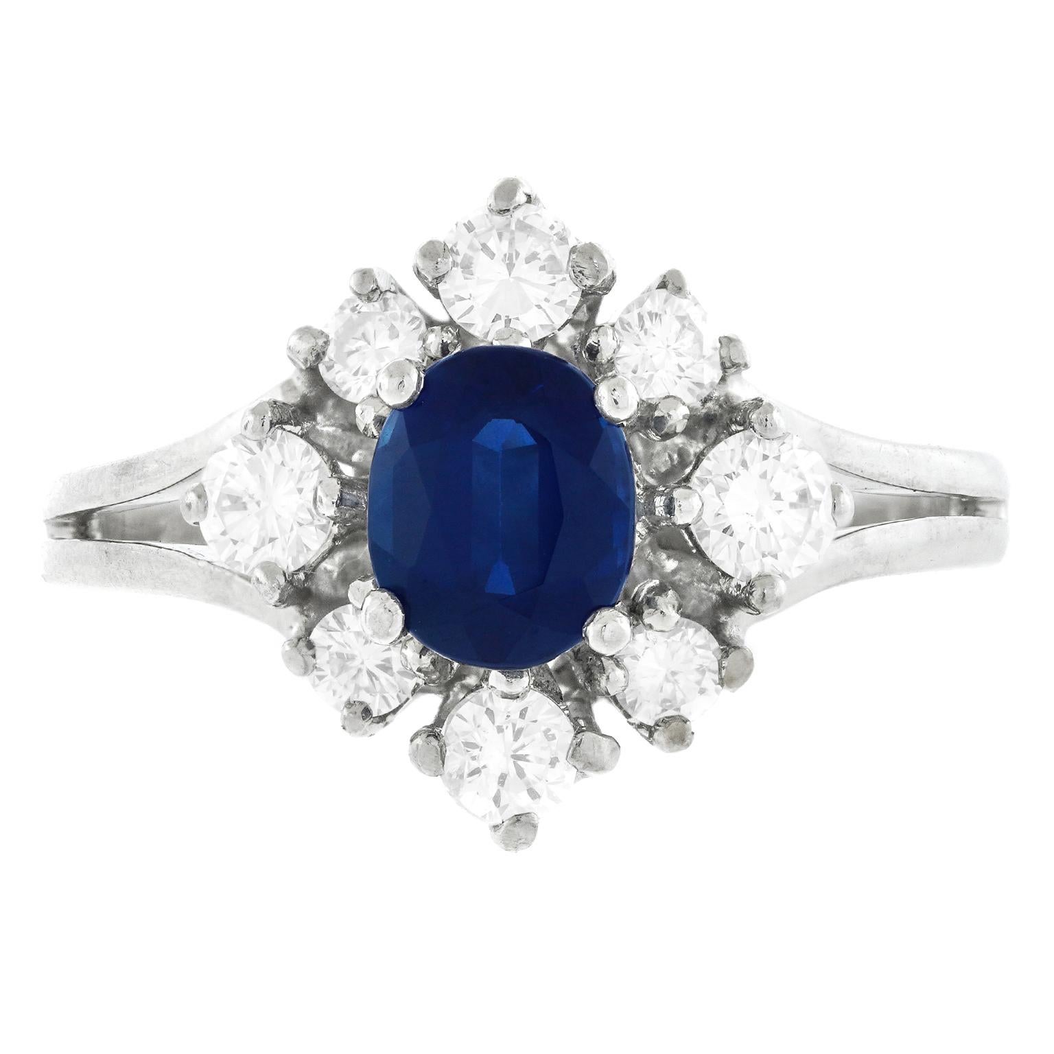 Oval Cut Sapphire & Diamond-Set Ring For Sale