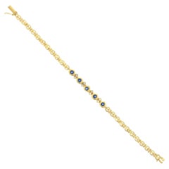 Bracelet de tennis saphir diamant .75cttw or jaune 14k
