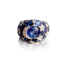 Anello con zaffiro e diamante in oro bianco 18 carati