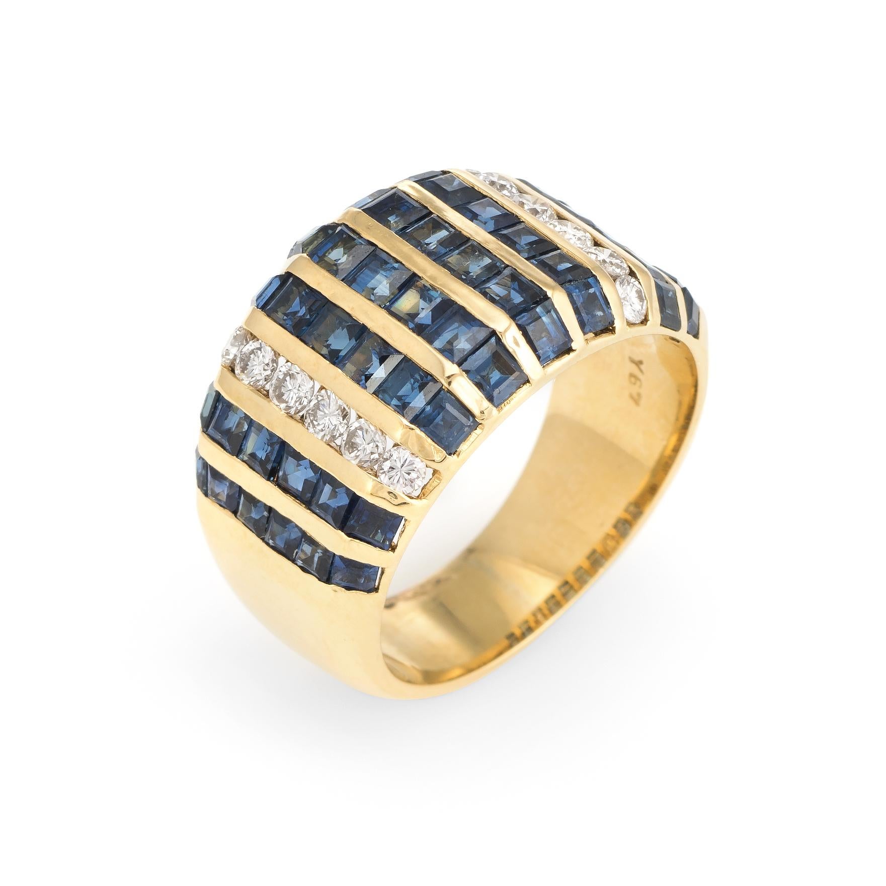 Distinct & stylish sapphire & diamond wide cigar band (circa 1980s), crafted in 18 karat yellow gold. 

Square cut sapphires are channel set into the band and total an estimated 2.15 carats. The diamonds are also channel set into the band and total