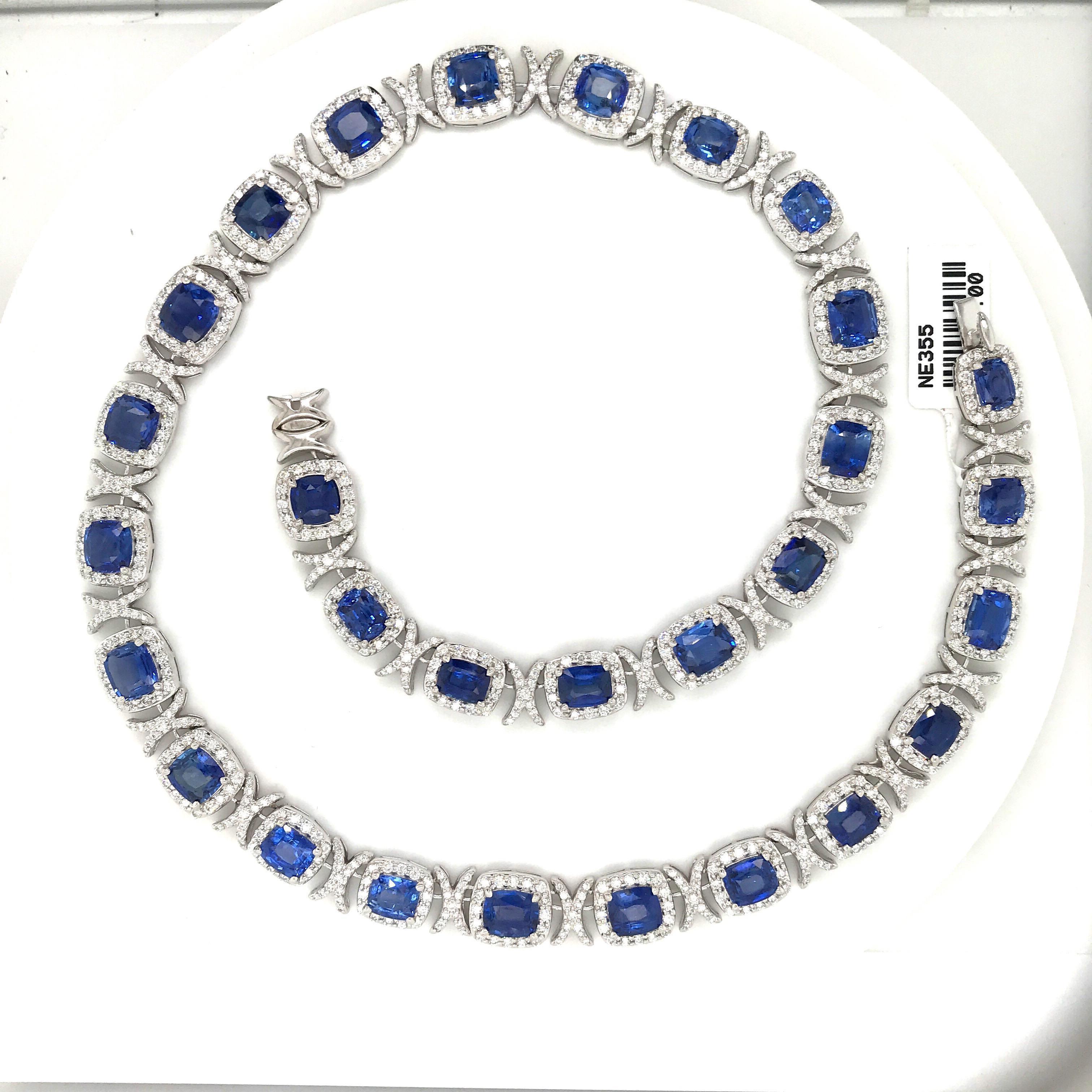 18K White gold 'XO' necklace featuring 19 cushion cut blue Sapphires weighing 44.13 carats flanked with 883 round brilliants weighing 11.10 carats.
Color G-H
Clarity VS
A real show stopper!!!