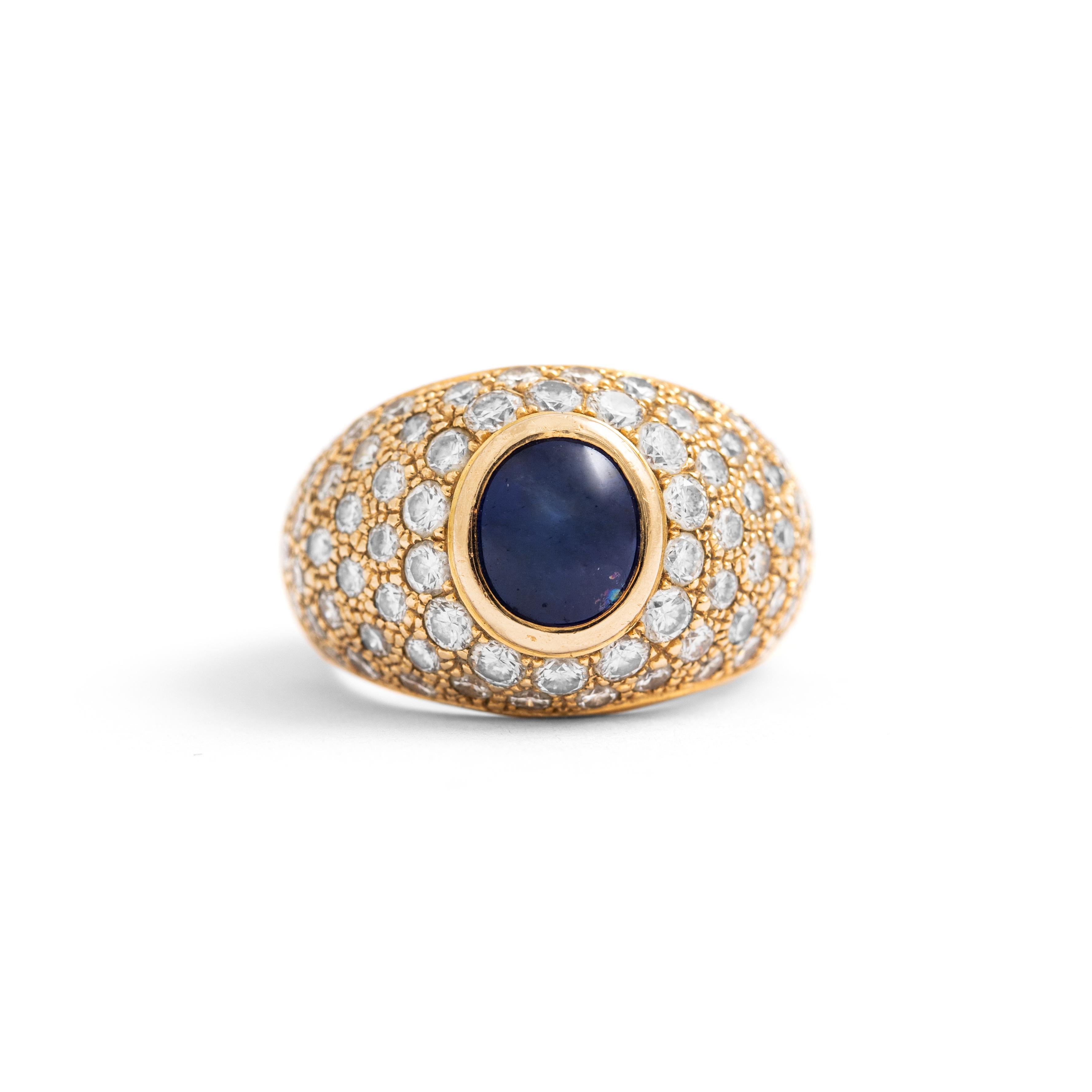 Sapphire Diamond Yellow Gold 18K Ring.
Sapphire cabochon (not tested): 8 x 7 x 5.80 mm.
Diamond: Approximately 1.20 / 1.70 carat.
Total weight: 16.37 grams.
Size: 54 / 6.75 US.
