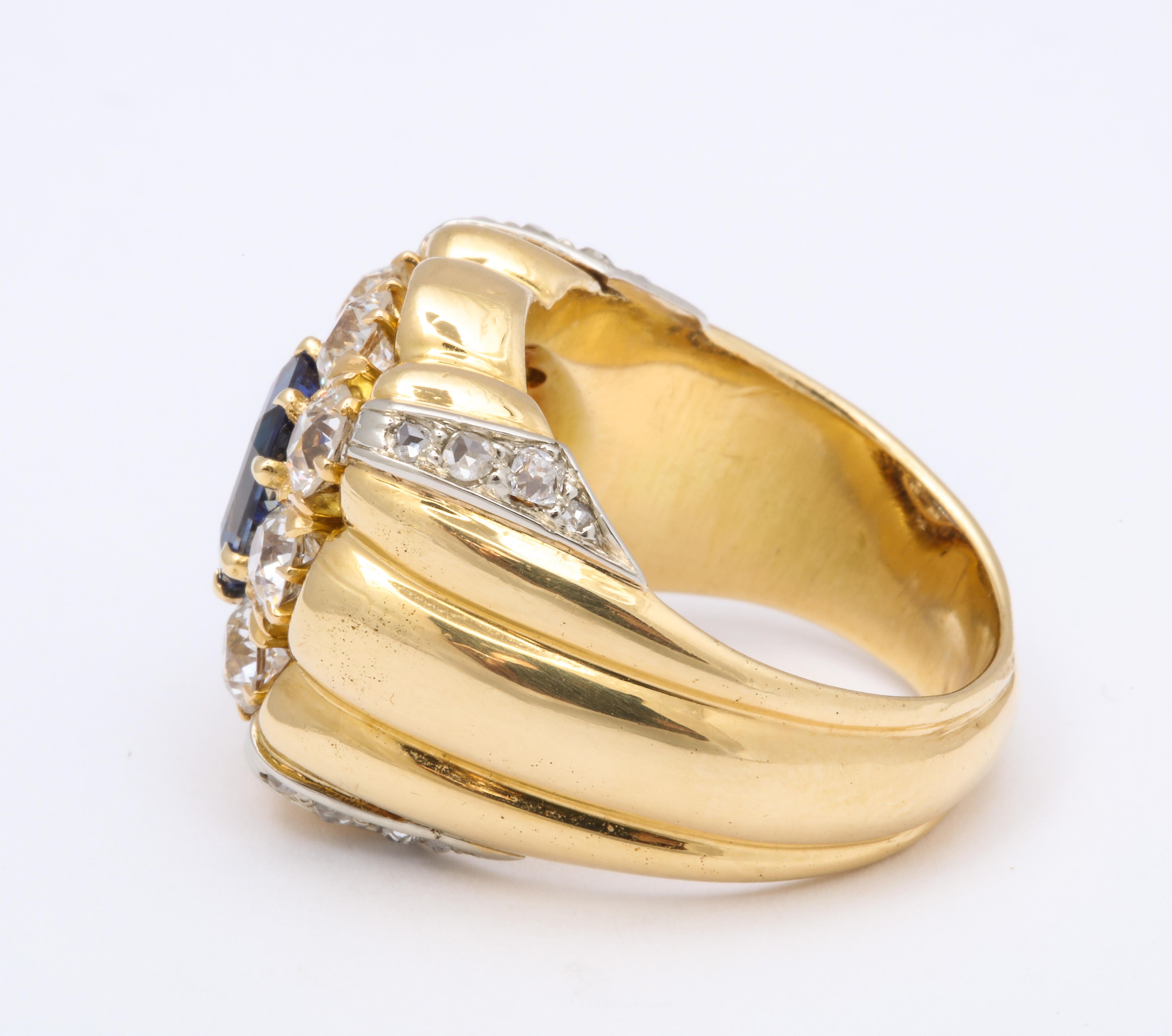 Emerald Cut Sapphire Diamond Yellow Gold Unisex Ring For Sale