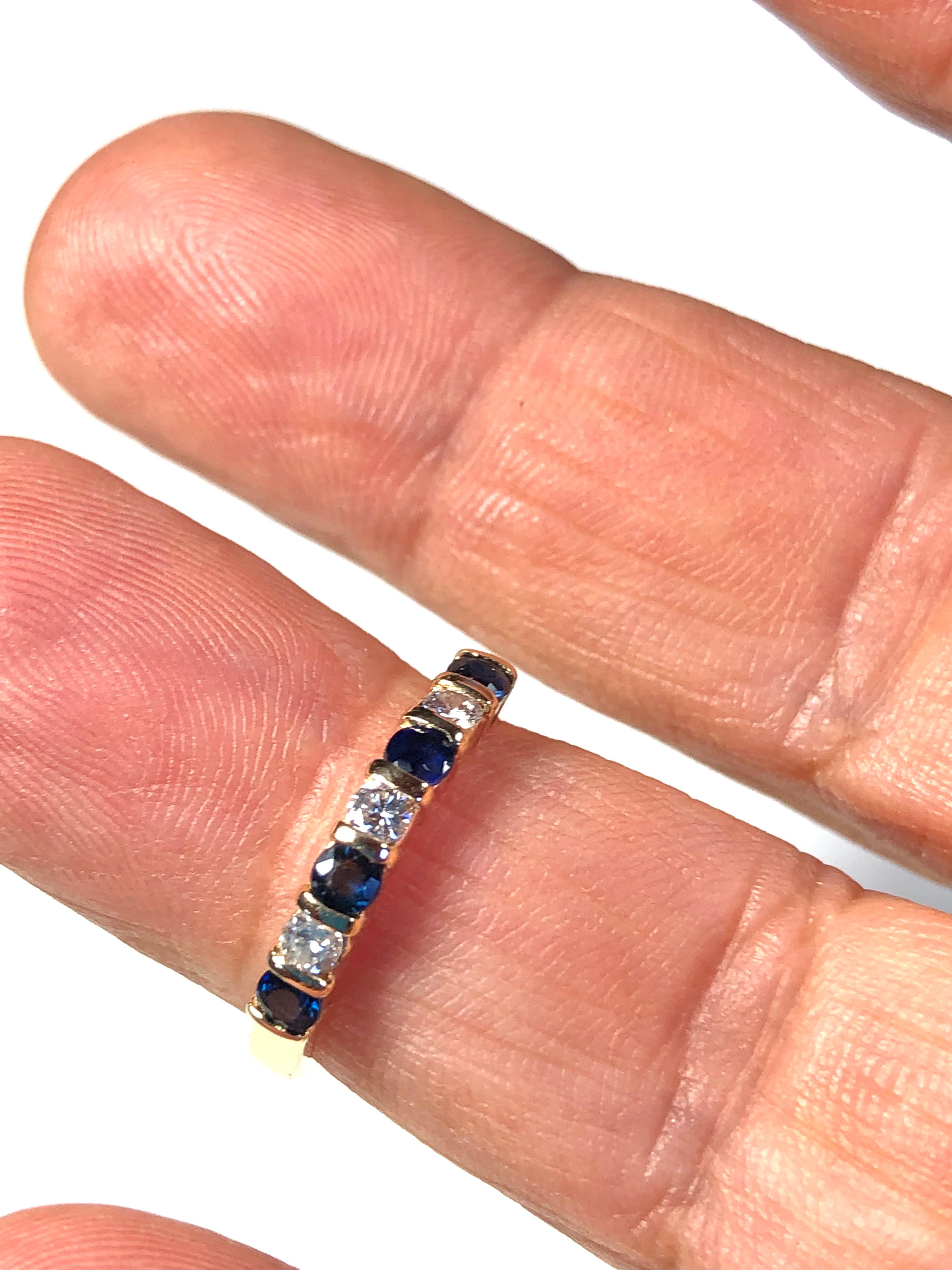 Natural Blue Sapphire and Round Brilliant Cut Diamond Wedding Band Ring 
Diamond quality: H in Color and SI in Clarity
Diamond Approx. Weight: 0.24ct 
Blue Sapphire Approx. Weight: 0.36ct 
Metal: 14K yellow gold Ring Width: 3.1mm Highly