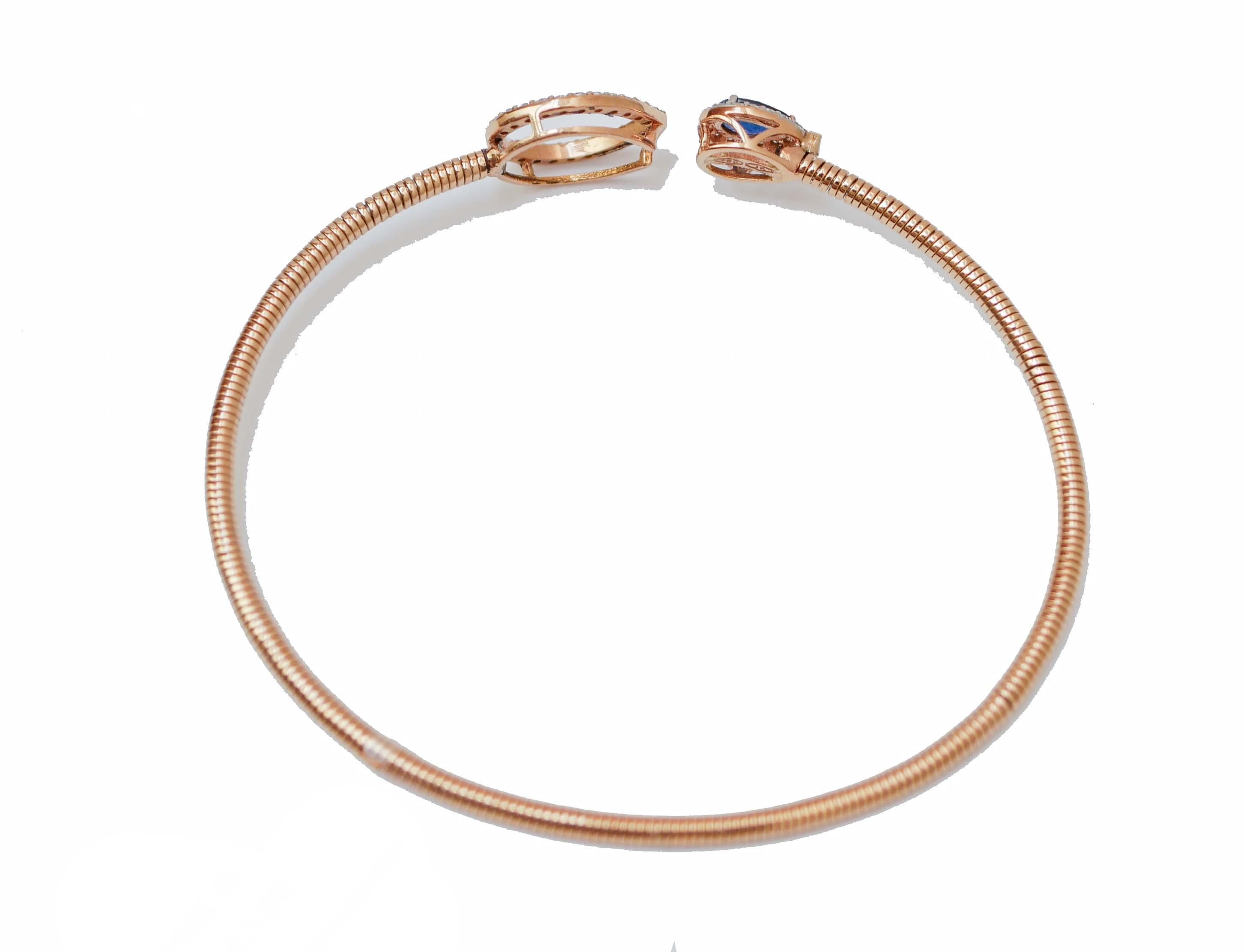 slender studded 18-carat rose-gold cuffs lined with diamonds