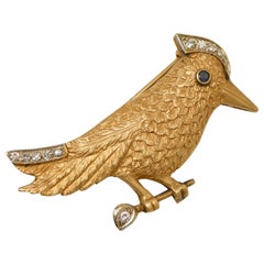 Sapphire, Diamonds, 18 Karat Yellow Gold Bird Brooch.