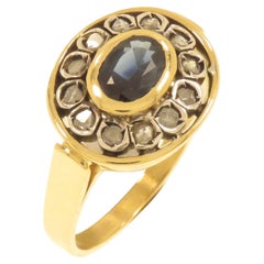 Bague en argent et or jaune 18 carats avec saphir et diamants