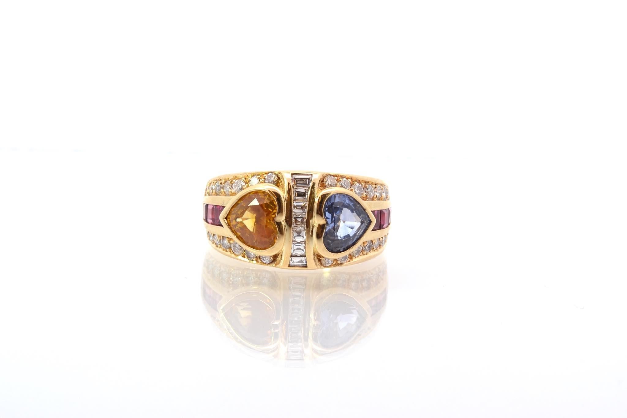 Stones: 2 Sapphires: 4 cts, diamonds: 1.20 cts and rubies: 0.30 ct
Material: 18k yellow gold
Weight: 14.3g
Period: 1980
Size: 52.5 (free sizing)
Certificate
Ref. : 25629