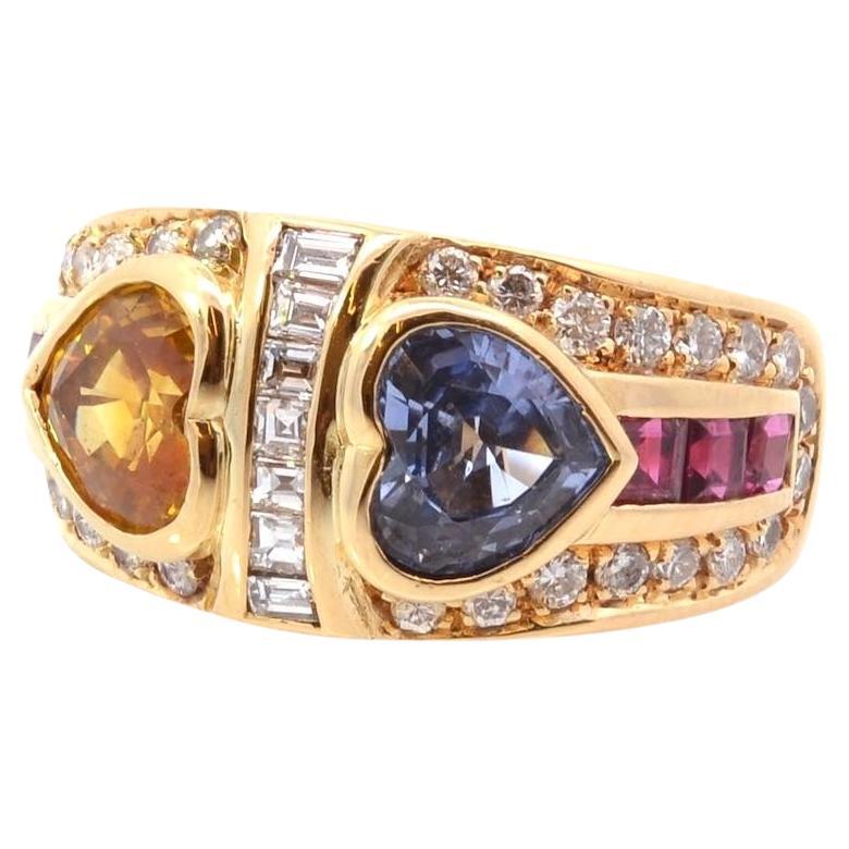 Sapphire, diamonds and rubies hearts ring in 18k gold For Sale