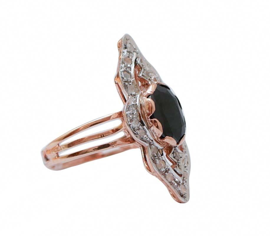 Retrò ring in 9 kt rose gold and silver structure mounted with a central sapphire surrounded by diamonds.
This ring was totally handmade by Italian master goldsmiths and it is in perfect conditions.
Diamonds 0.24 ct
Sapphire 3.50 ct
Total Weight