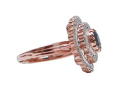 Ring mit Saphiren, Diamanten, Roségold und Silber.