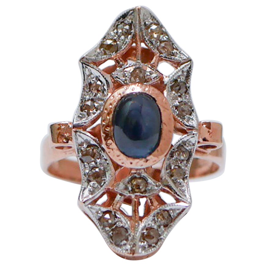 Anello con zaffiro, diamanti, oro rosa e argento.