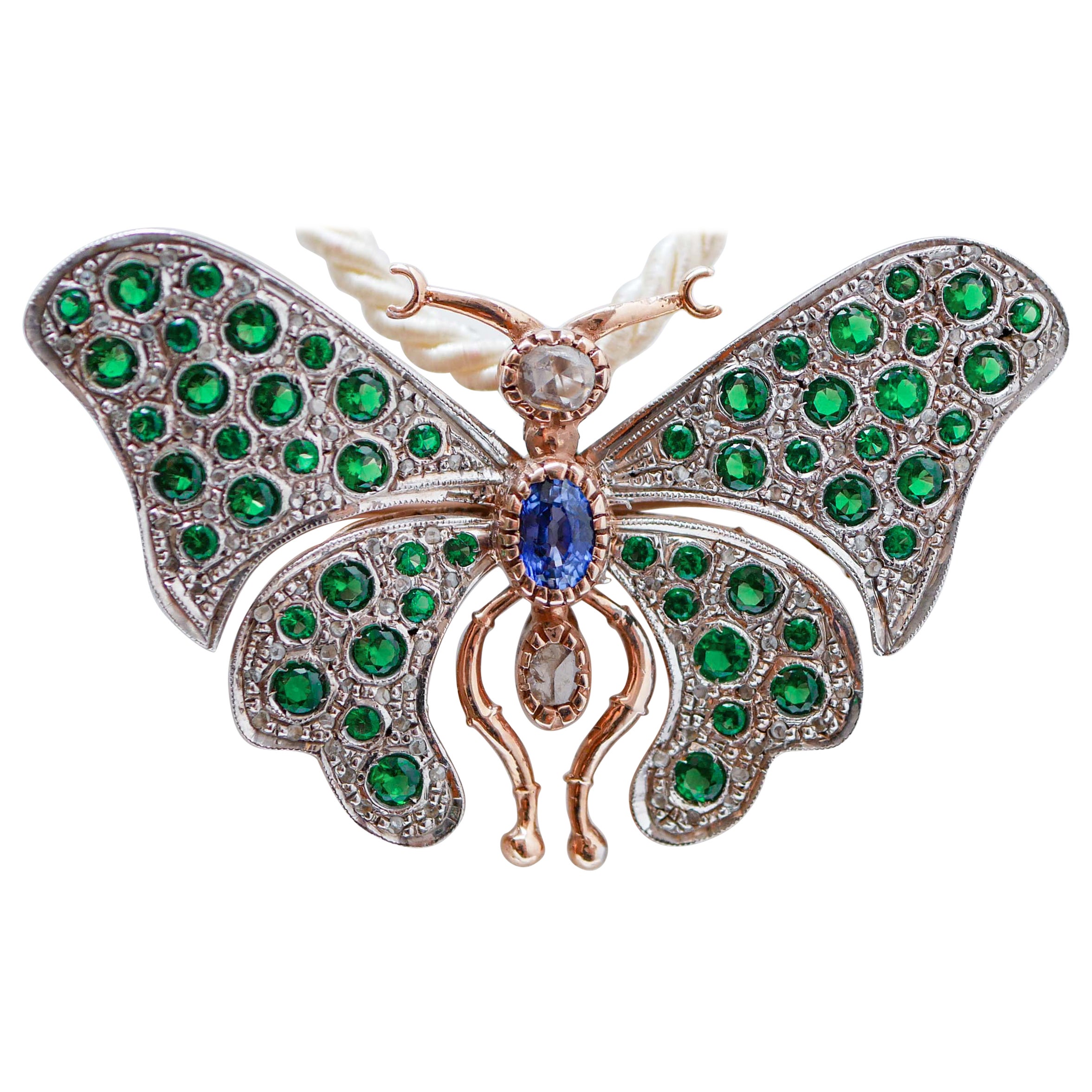 Broche papillon en saphir, diamants, spinelle, or rose et argent
