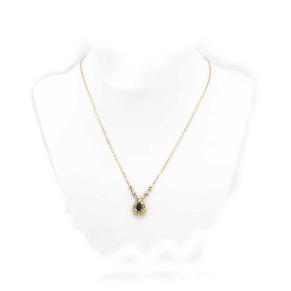 Fun and colorful collection characterized by a classic design, but with a modern mix. Yellow and white gold pendant with blue teardrop-shaped sapphire, yellow sapphire and diamonds. 40cm/15,74in chain.