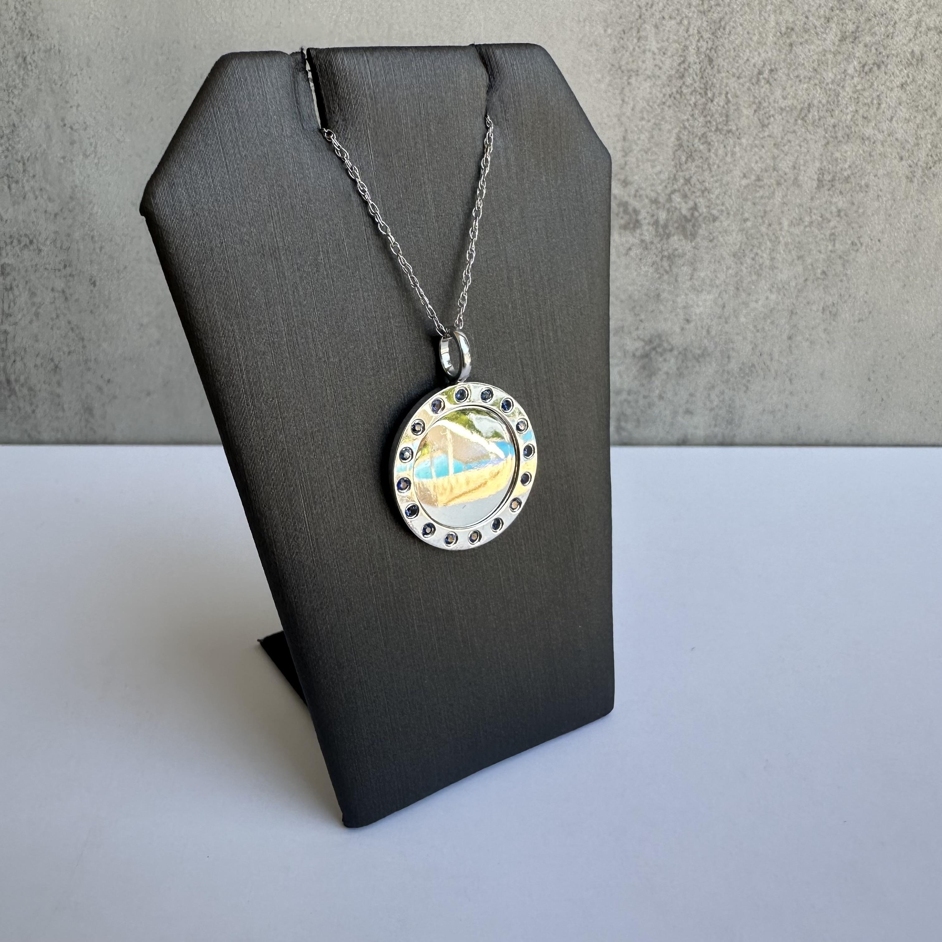Enhance your jewelry collection with this exquisite Sapphire Disc Necklace in 14kt White Gold. Featuring 0.28 carats of blue natural sapphires, this necklace combines timeless beauty with modern elegance, perfect for any occasion.
Craftsmanship and