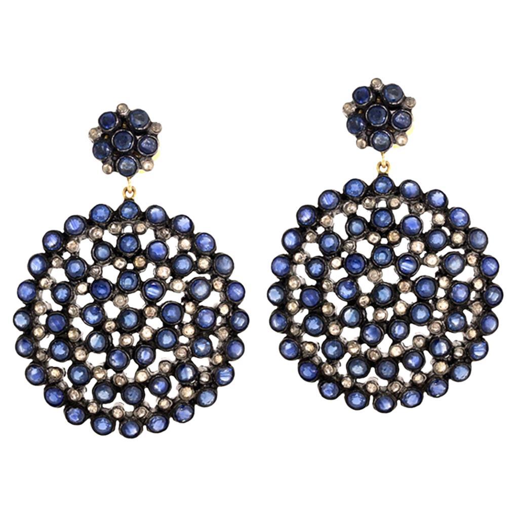 Orecchini pendenti con zaffiro e diamanti in oro giallo 14 carati