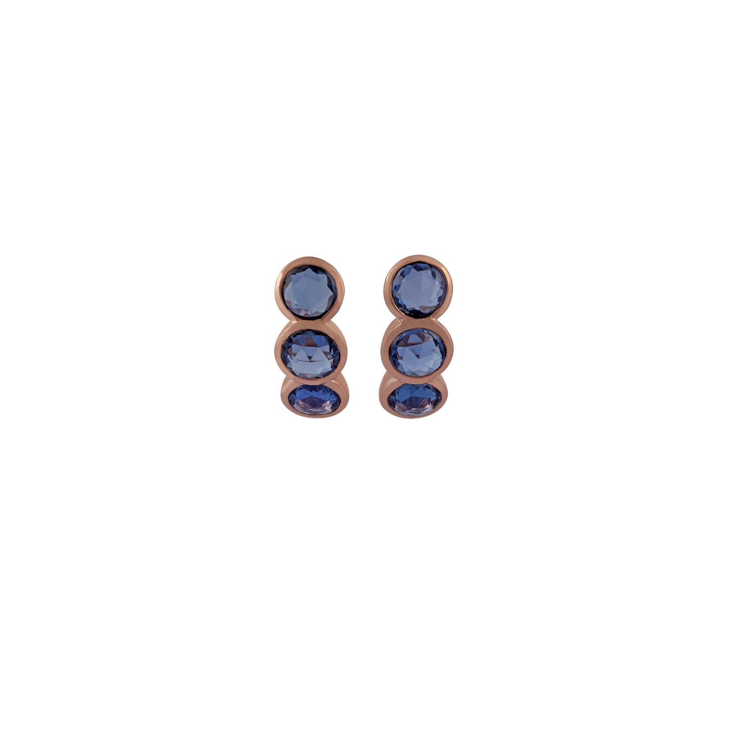 This is an elegant pair of earring features 6 rose cuts round-shaped sapphire 5.27 carat, studded in 18 karat rose gold, the total weight of gold in the earring is 4.61 grams, the sapphires are set in the close setting, this earring has a simple
