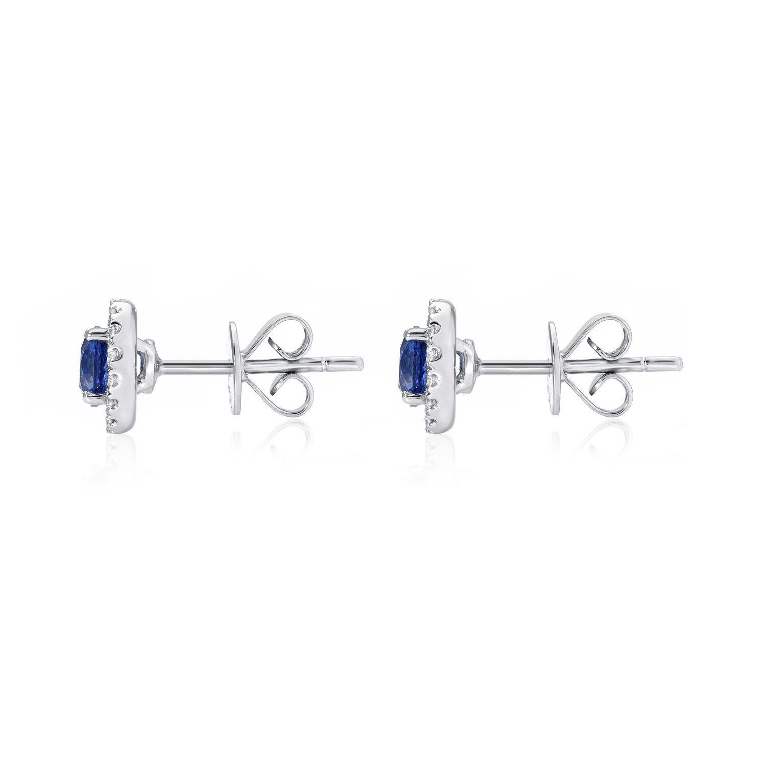 Stud earrings, featuring a pair of round blue Sapphires weighing a total of 0.97 carats, framed by a 0.20 carats total diamond halo.
These Sapphire diamond stud earrings are crafted in 18K white gold.
Returns are accepted and paid by us within 7