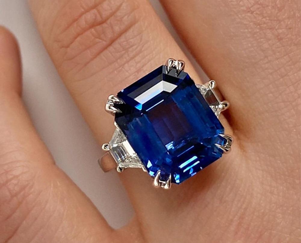 Sapphire Weight: 11.38 CT, Diamond Weight: 0.78 CT, Metal: Platinum, Ring Size: 7, Shape: Emerald-Cut, Color: Blue, Hardness: 9, Birthstone: September, Certificate: CD Certified