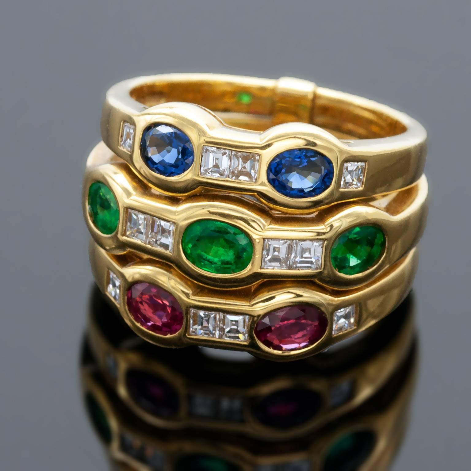 Precious multicolour ring: Three 18kt gold bands each set with square diamonds and oval coloured gem: Sapphire, Emerald ,Ruby.
The make is excellent, the gemstones has intense colors and the diamonds are FG VS.
Diamonds: 0.45 carat
Total coulored