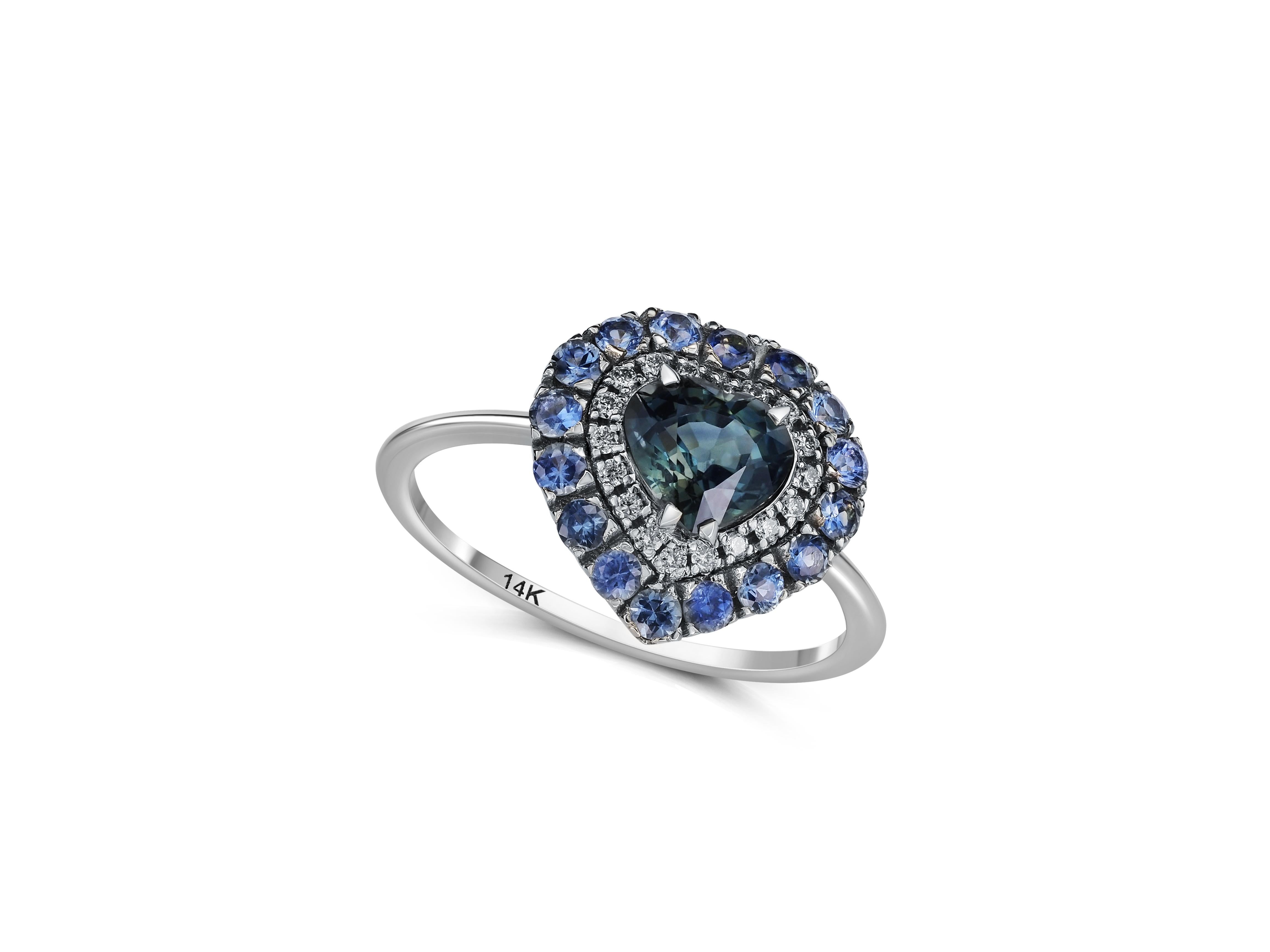 Bague de fiançailles en saphir et or blanc 14 carats. Bague en saphir bleu et diamants. 3