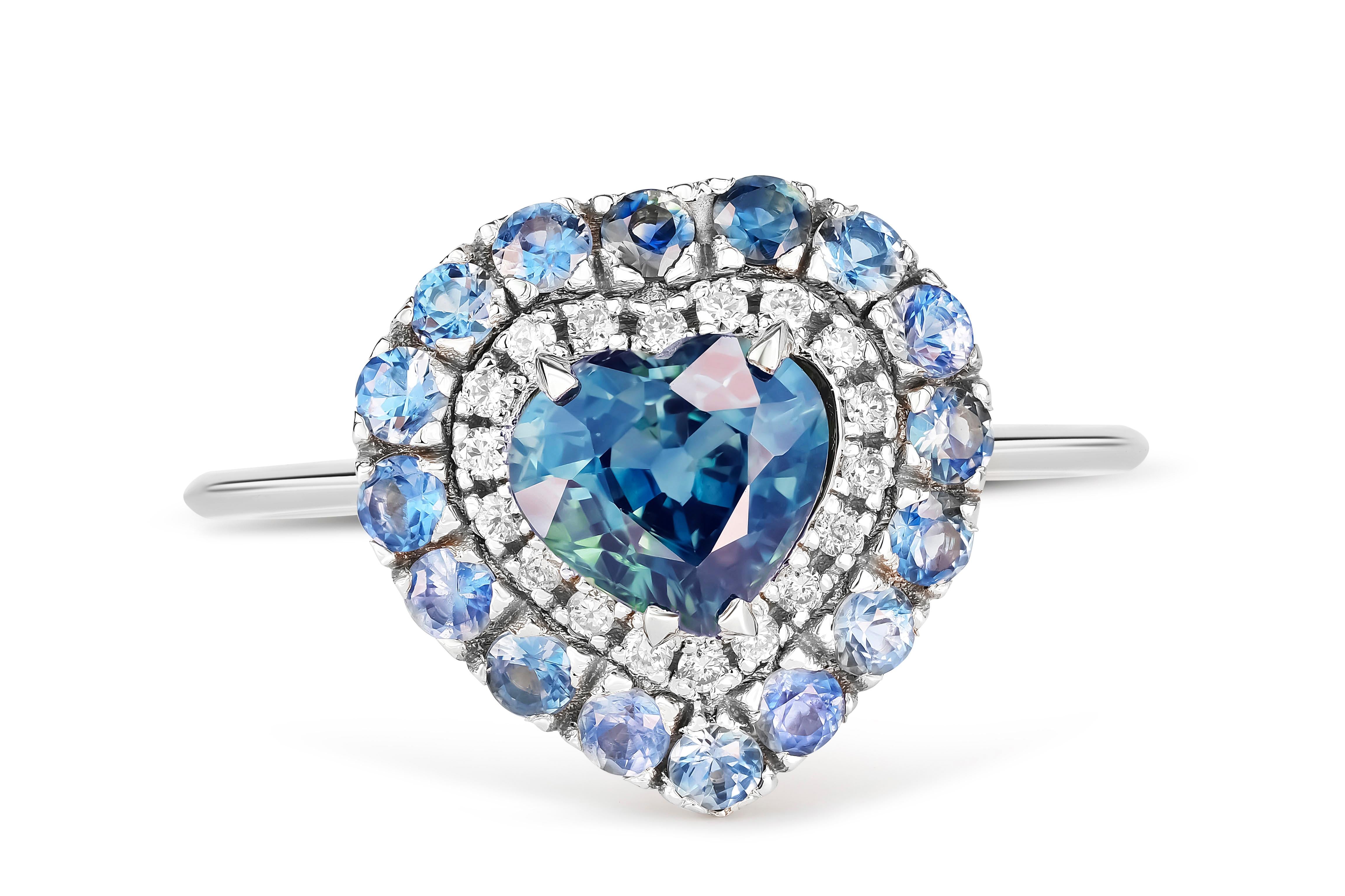 Moderne Bague de fiançailles en saphir et or blanc 14 carats. Bague en saphir bleu et diamants.