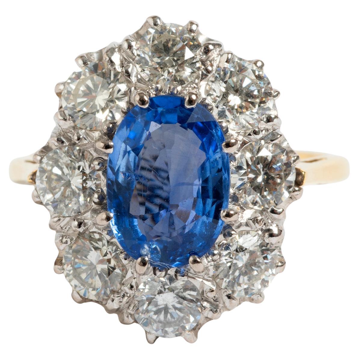 Sapphire (est 1.58ct) & 8 x Diamond (est 1.75ct) Cluster Ring, 18K Yellow Gold. For Sale