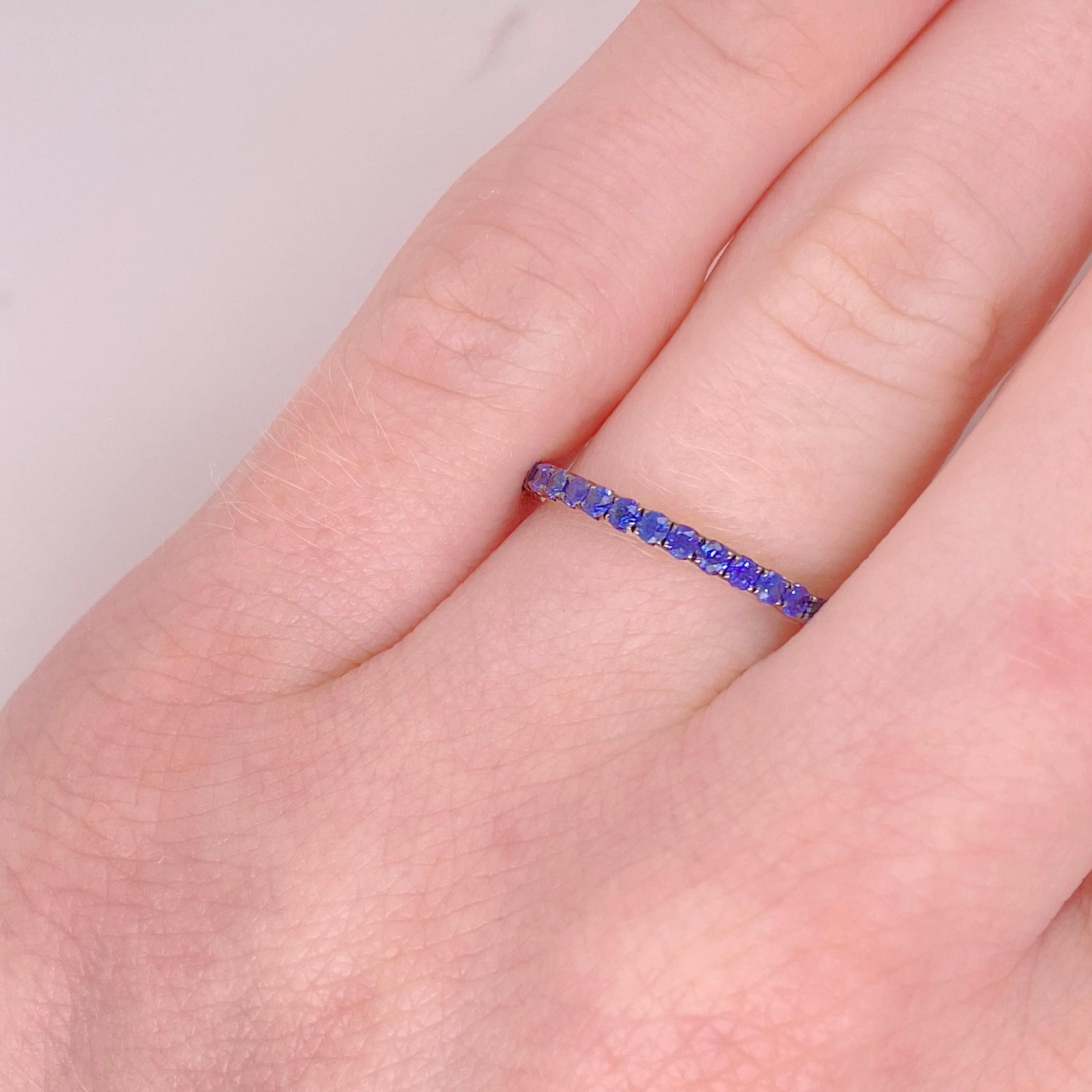 If you want a sapphire band and want a straight line of blue, this is the ring for you. The way the sapphires are set closely together, you see a line of blue and they are set securely in 18k white gold. We normally sell two of these bands together
