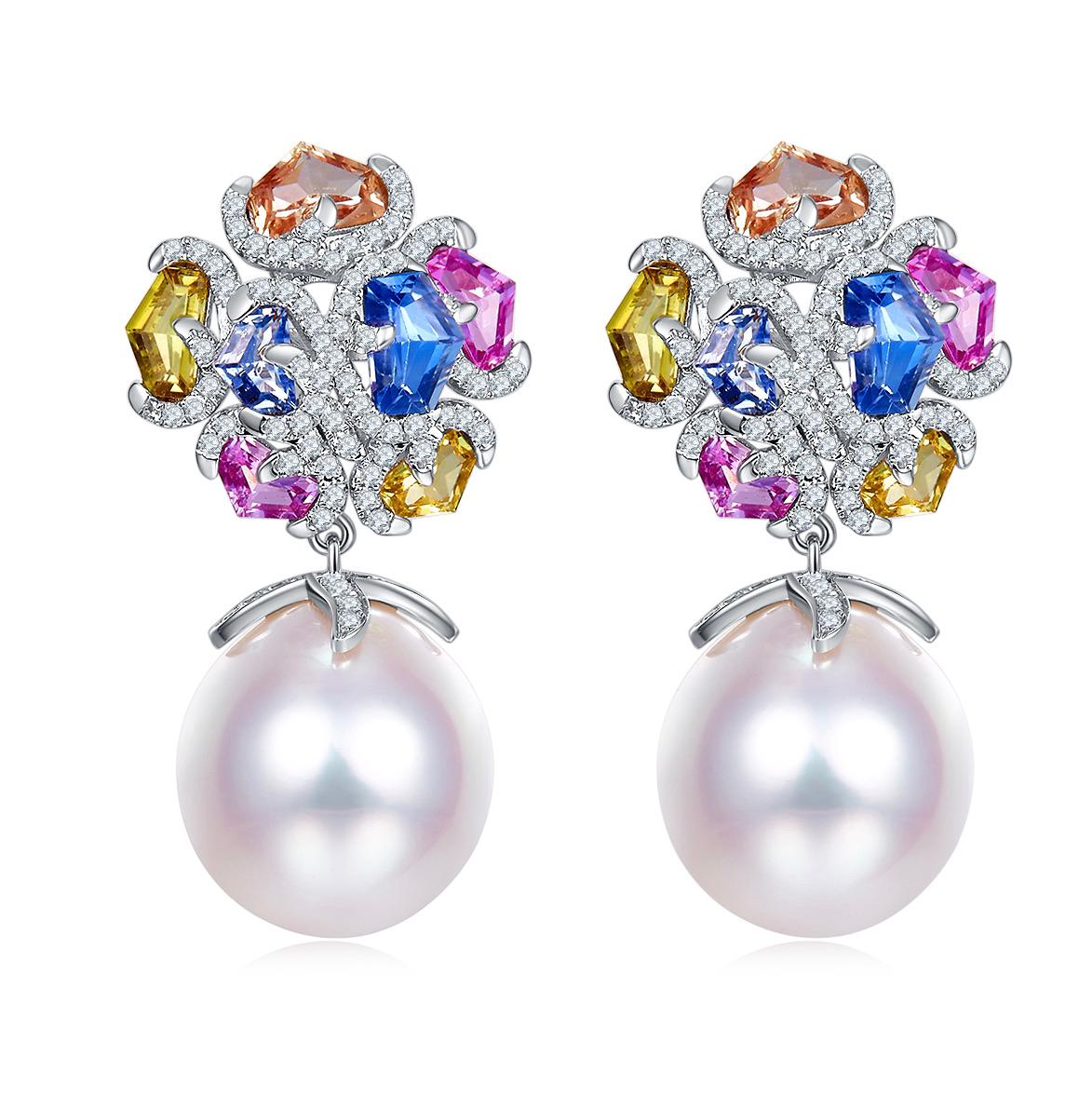 Perle des mers du Sud 13mm

Diamant naturel taille brillant, couleur E/F, pureté VS, poids total 0,48 ct.

Saphir de couleur fantaisie poids 3.69CT

Sertie en or jaune 18k et dos de poteau papillon

total Or blanc 18k 6,22 grammes