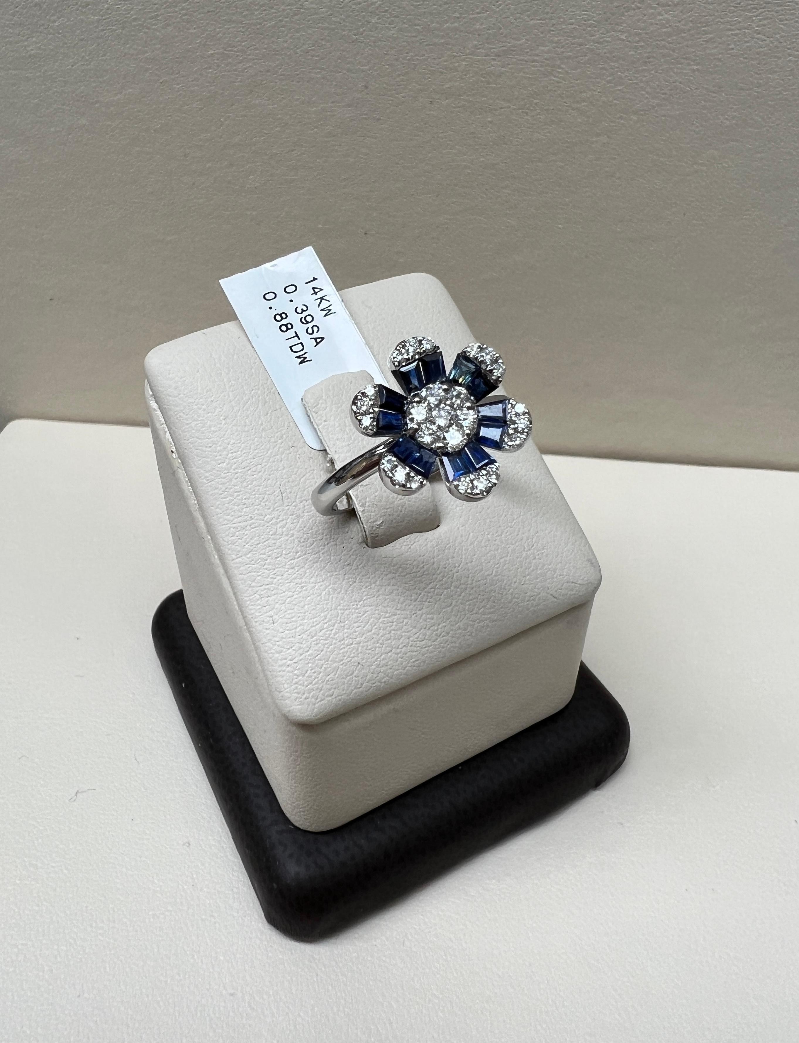Solid 14K White Gold

Natural Round White Diamonds .88 Total Diamond Weight

G-H Color SI Clarity 

Natural Blue Sapphire Baguettes .39 Total Carat Weight

Size 6.5 - Sizable 

Free Insured Shipping