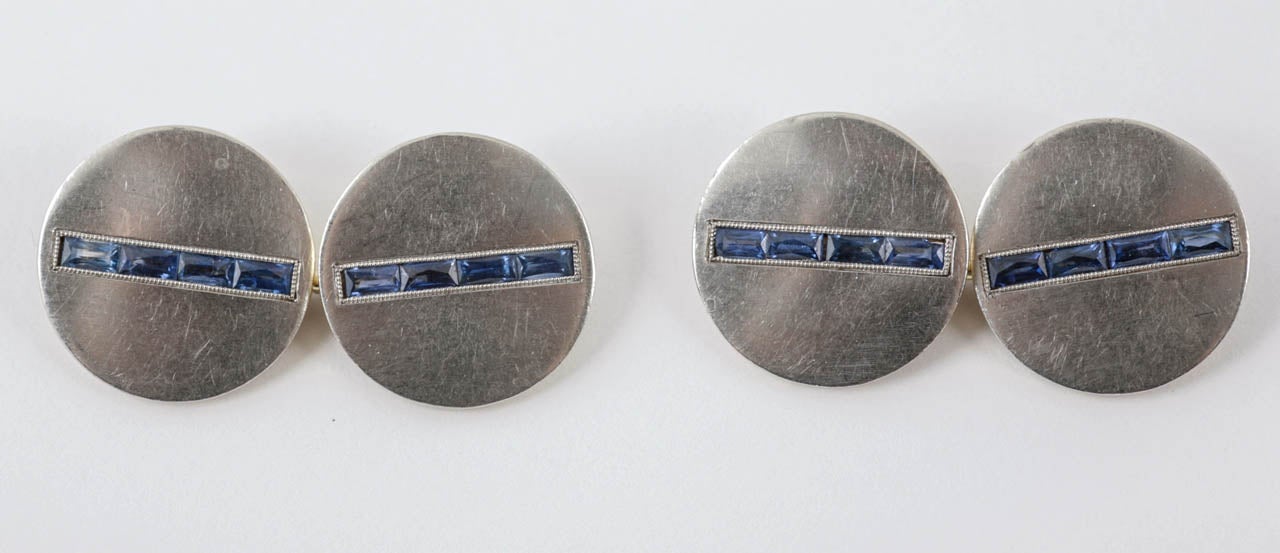 A Vintage pair of 18 karat yellow gold double sided cufflinks, platinum faced each with four french cut sapphires. Circular in shape. Maker Wordley, Allsopp & Bliss, Newark USA.
Measures 13mm across.
1930’s Vintage piece.
20th century, American