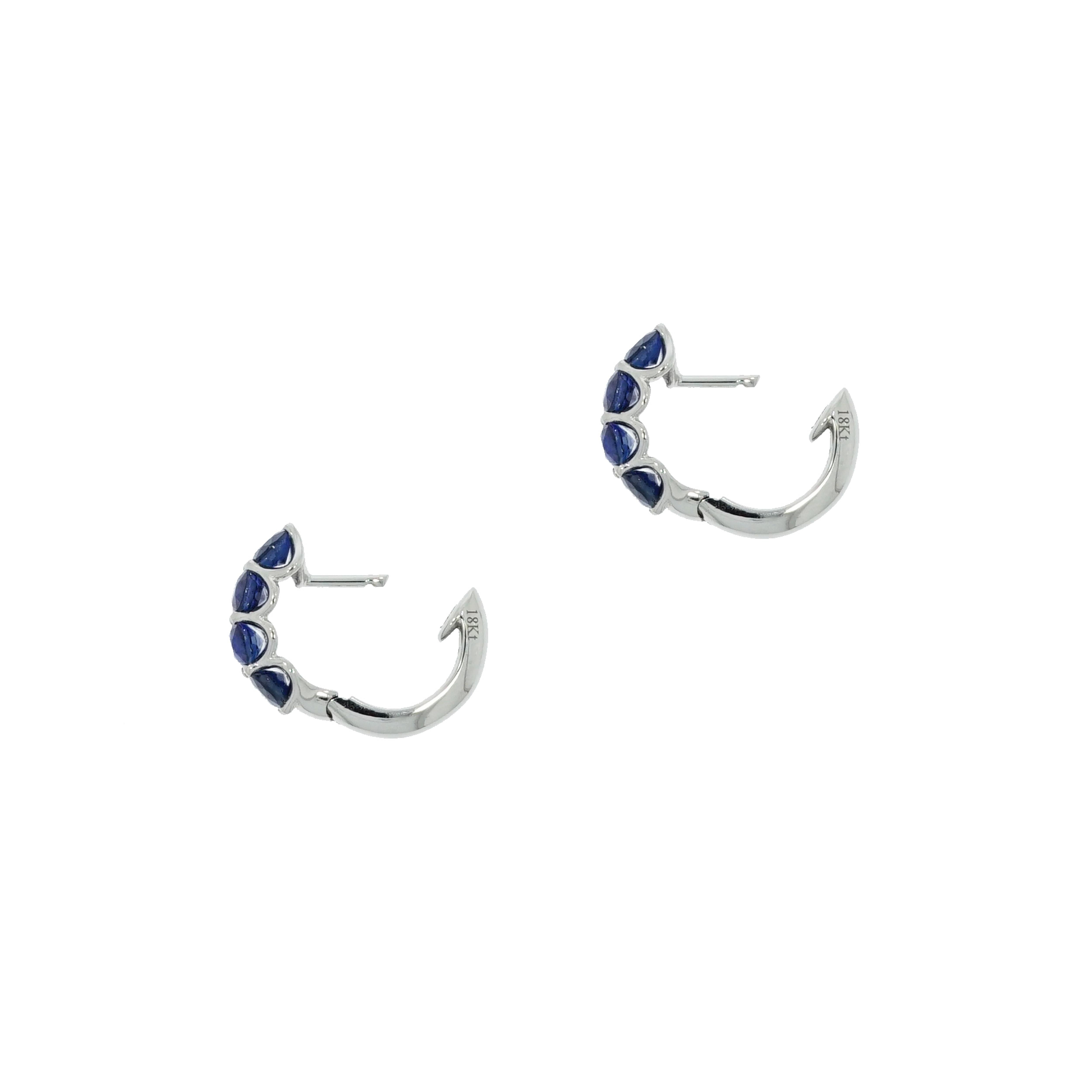 Modern Sapphire Huggie White Gold Earrings For Sale
