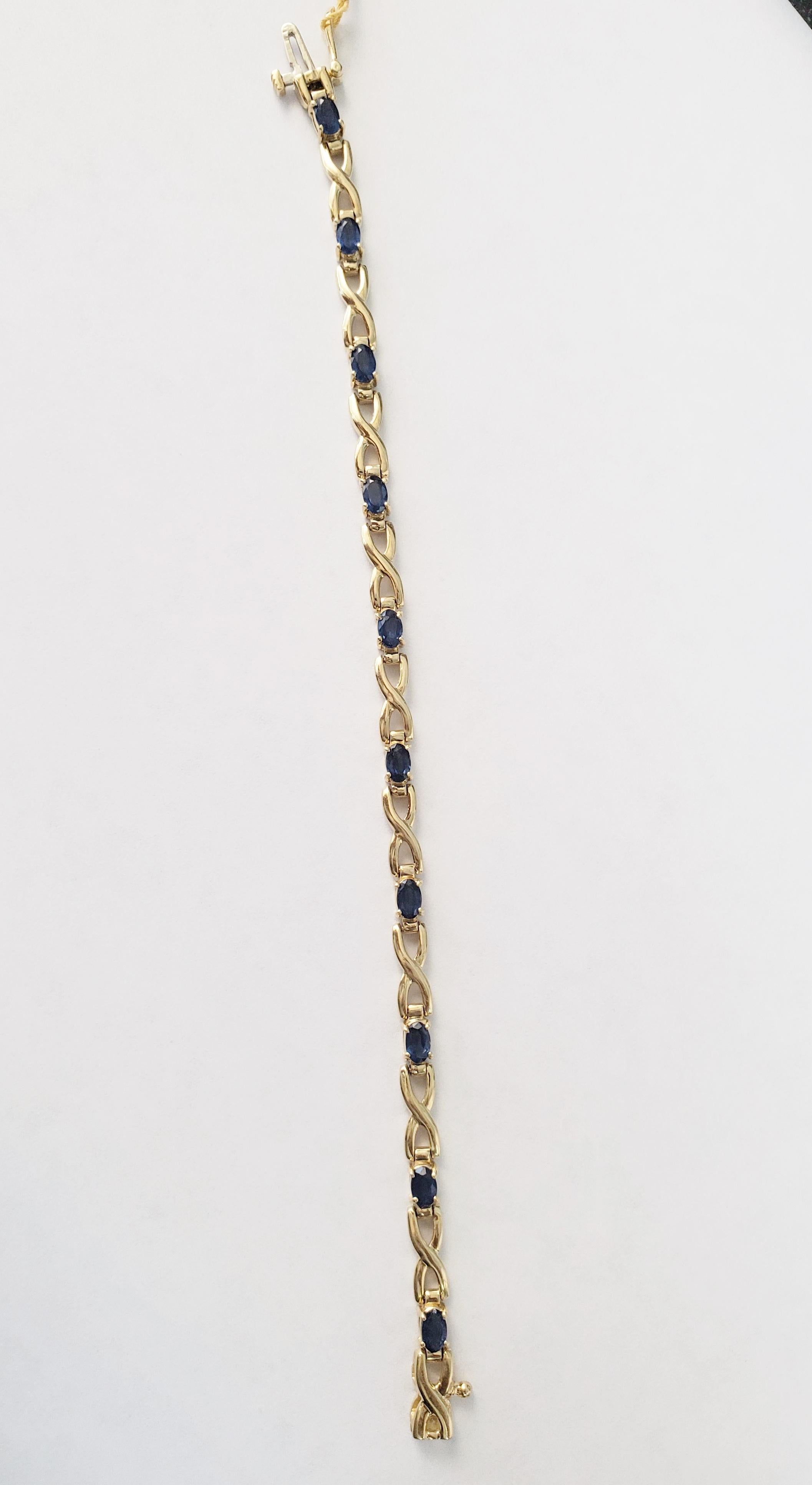 Bracciale tennis Infinity con zaffiro 1,50cttw in oro giallo 14k In condizioni Nuovo in vendita a Sugar Land, TX
