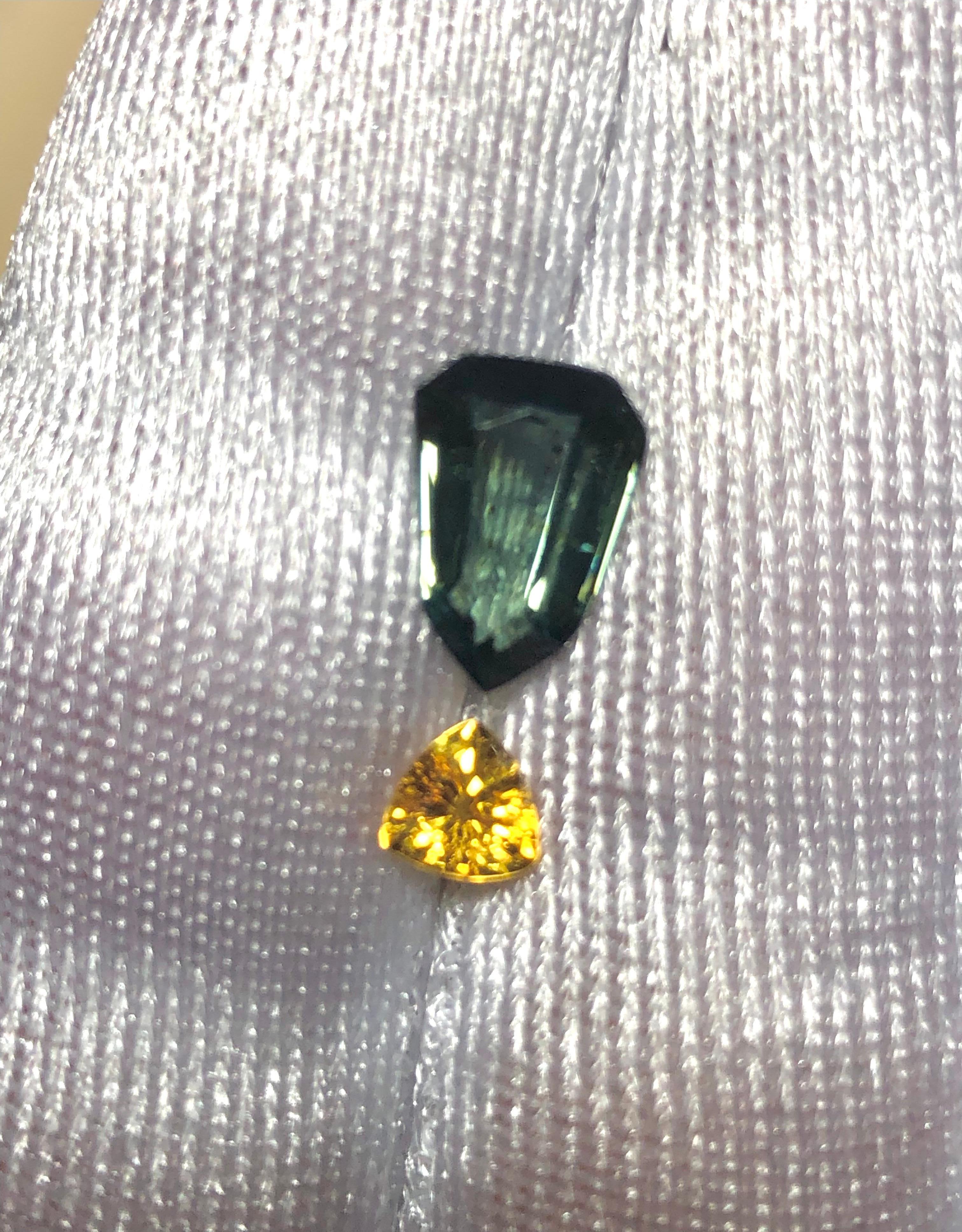 The blue-green Kite-Shape sapphires are very clean VS in clarity weighing 3.04 carats company with a yellow sapphire trillion cut weighing 0.50 carats. Full of fire and brilliance!
**these incredible gemstones are available to purchase as loose