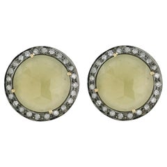 Borchie minimaliste con zaffiro e diamanti in oro giallo 18 carati